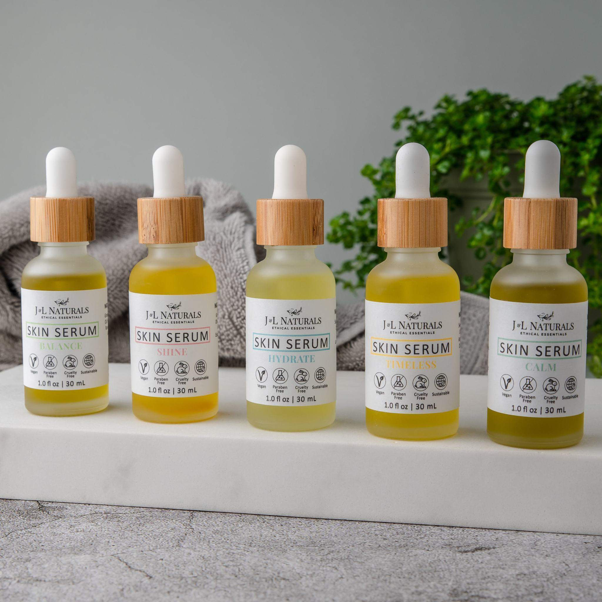 Skin Serum Bundle featuring five natural serums for various skin types, each in a 1.0 fl oz bottle.