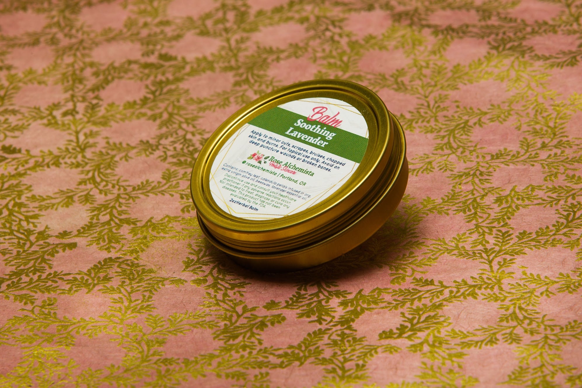 Soothing Lavender Balm in a 2oz travel twist tin, featuring vibrant green color and lavender scent, ideal for skin rejuvenation.