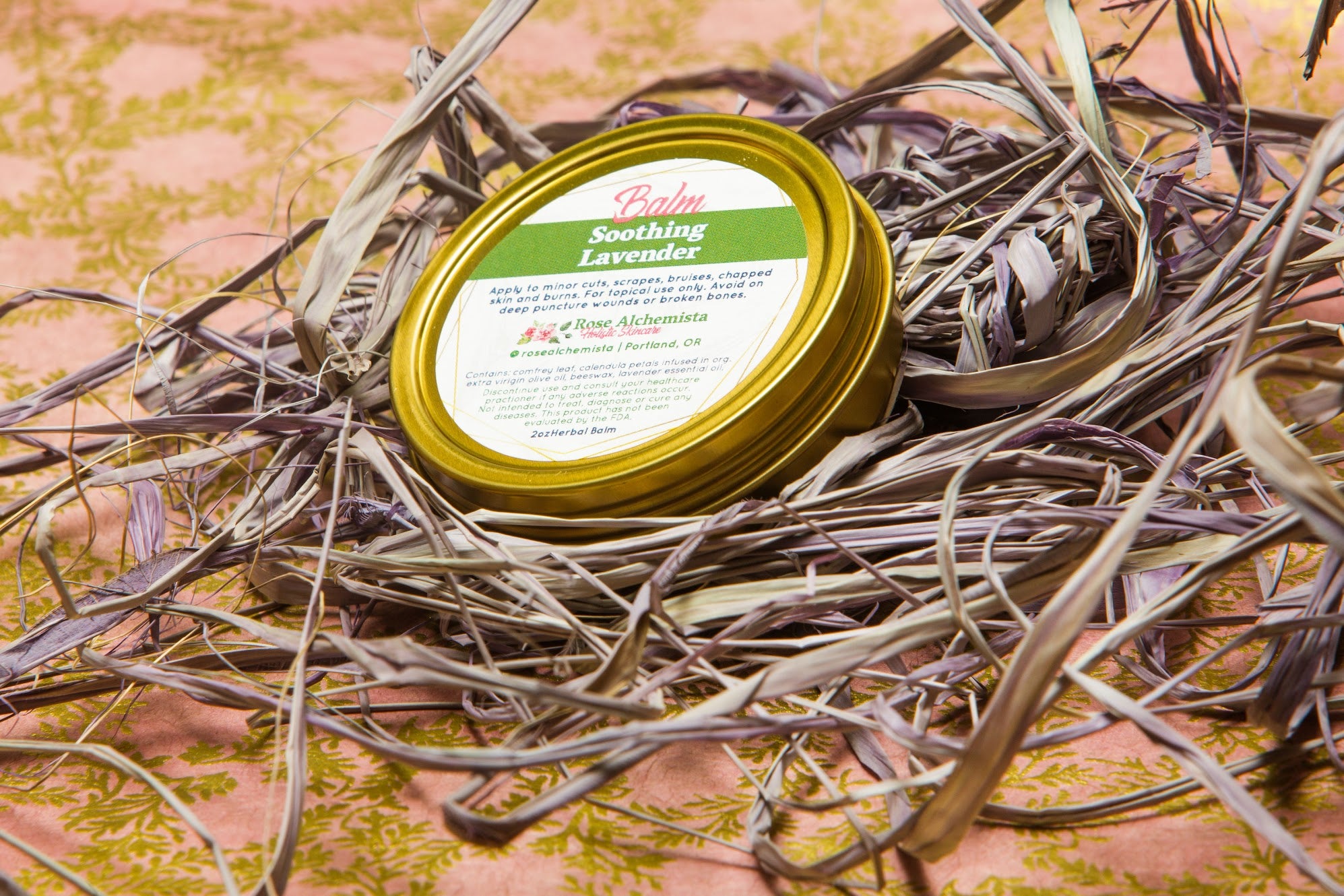 Soothing Lavender Balm in a 2oz travel twist tin, featuring vibrant green color and lavender scent, ideal for skin rejuvenation.