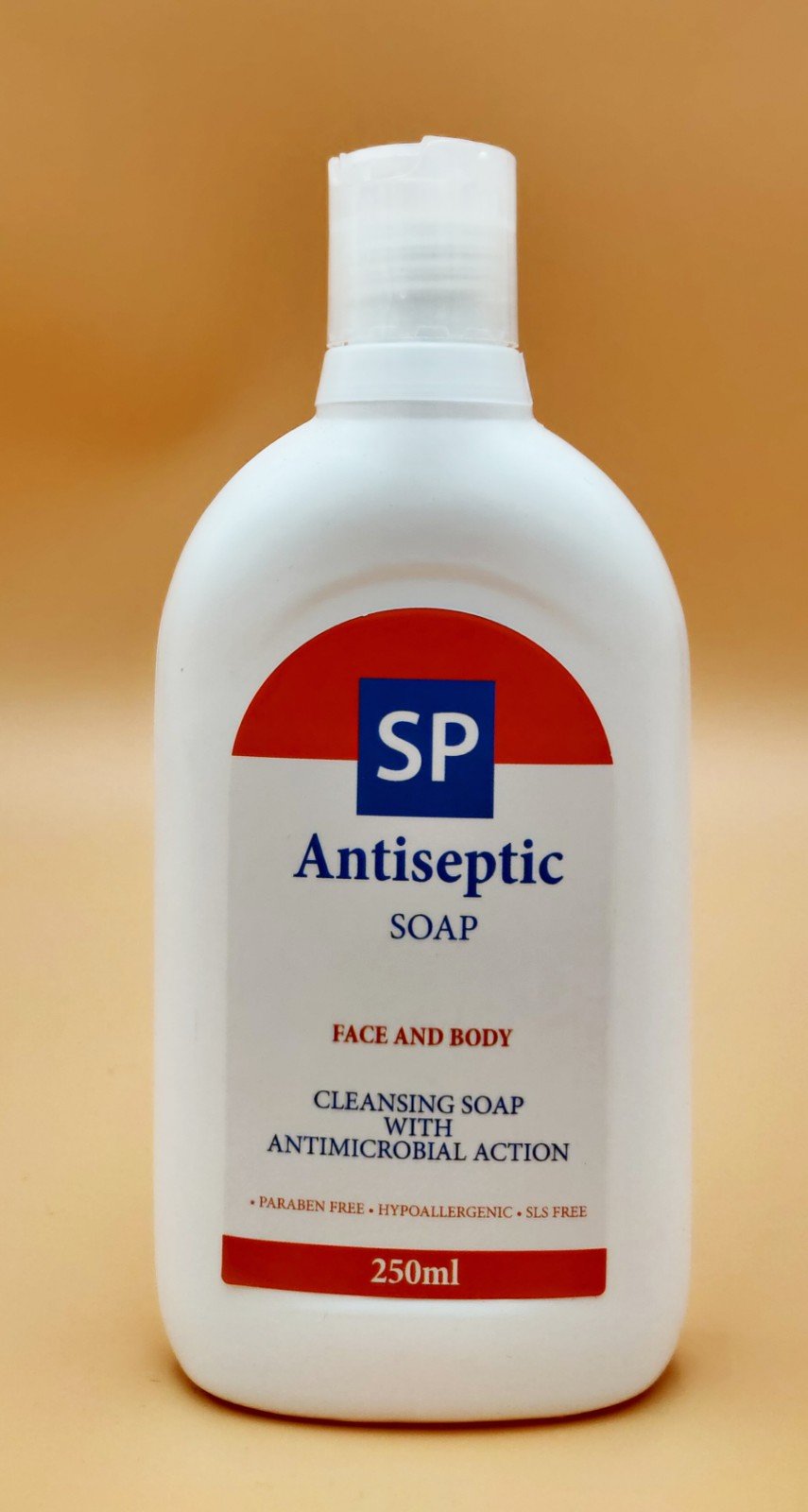 SP Antiseptic Soap bottle with clear liquid, designed for effective hygiene against microorganisms.