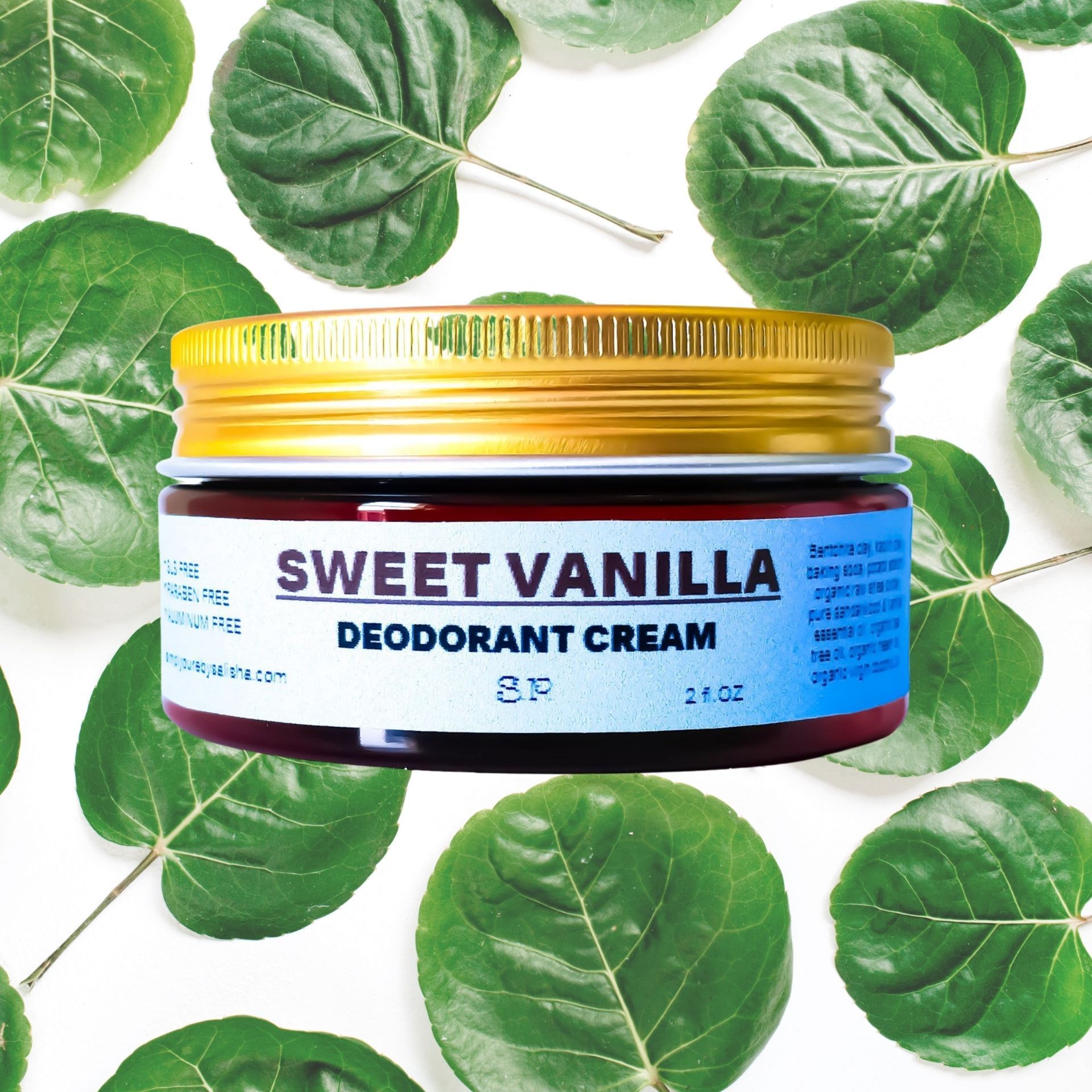 A jar of Sweet Vanilla Deodorant Cream with a creamy texture, featuring natural ingredients like vanilla and tea tree oil, ideal for sensitive skin.