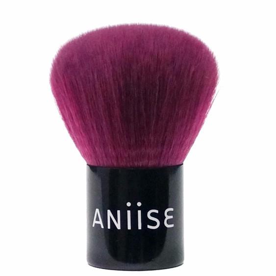 A close-up of the Synthetic Kabuki Brush with soft, natural hair bristles and a short handle, ideal for makeup application.