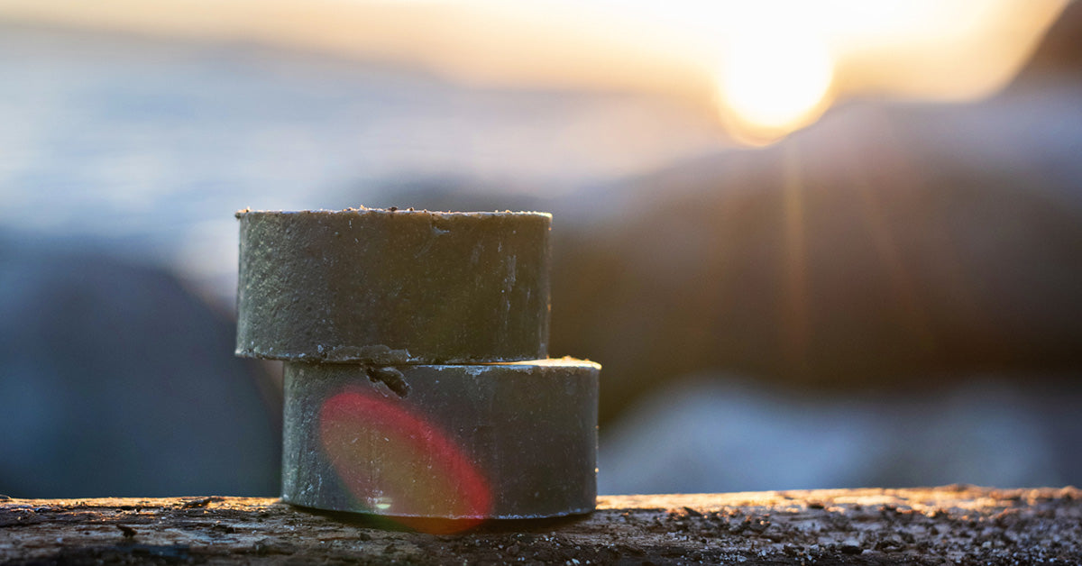 The Collection skincare trio featuring GO Clay Mask, Ocean Clay Cleansing Bars, and Ocean Salt Scrub, beautifully arranged for a spa-like experience.