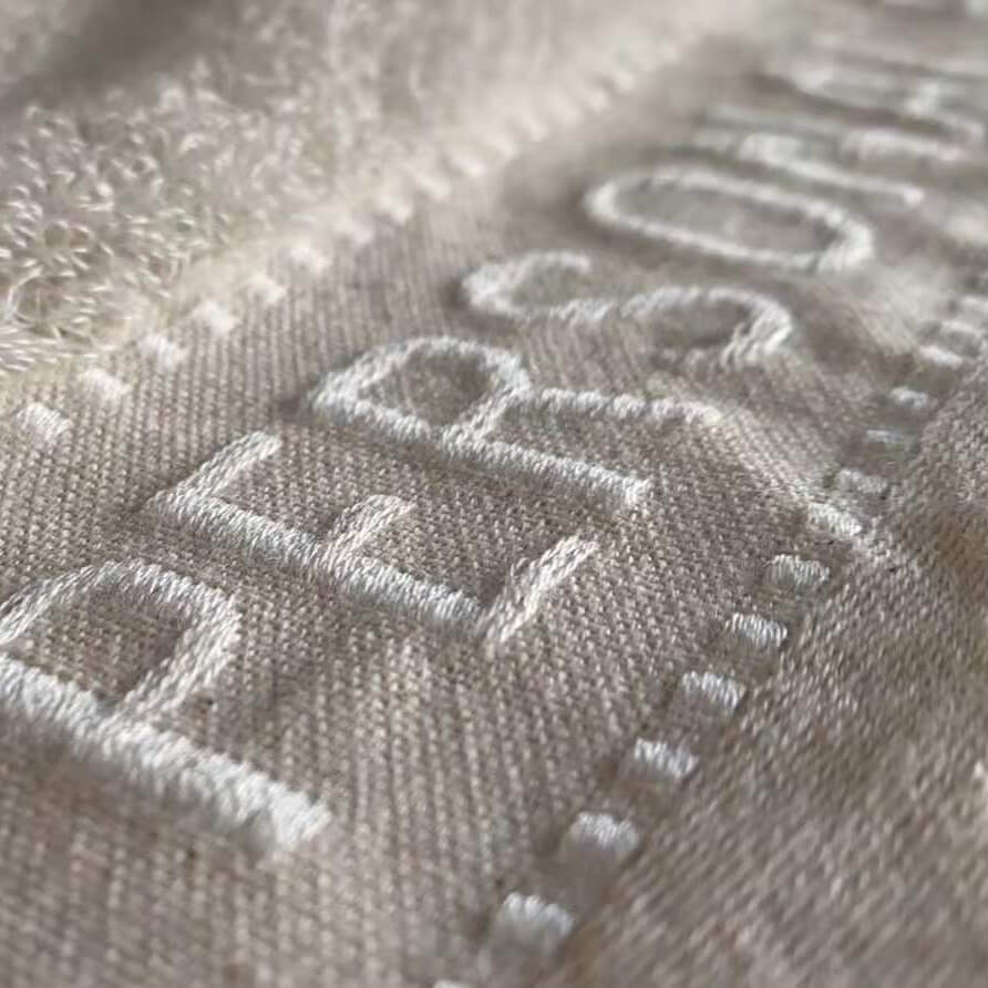 The Personal Barber Grey Bamboo Shaving Towel, soft and luxurious, eco-friendly bamboo material, perfect for enhancing shaving experience.