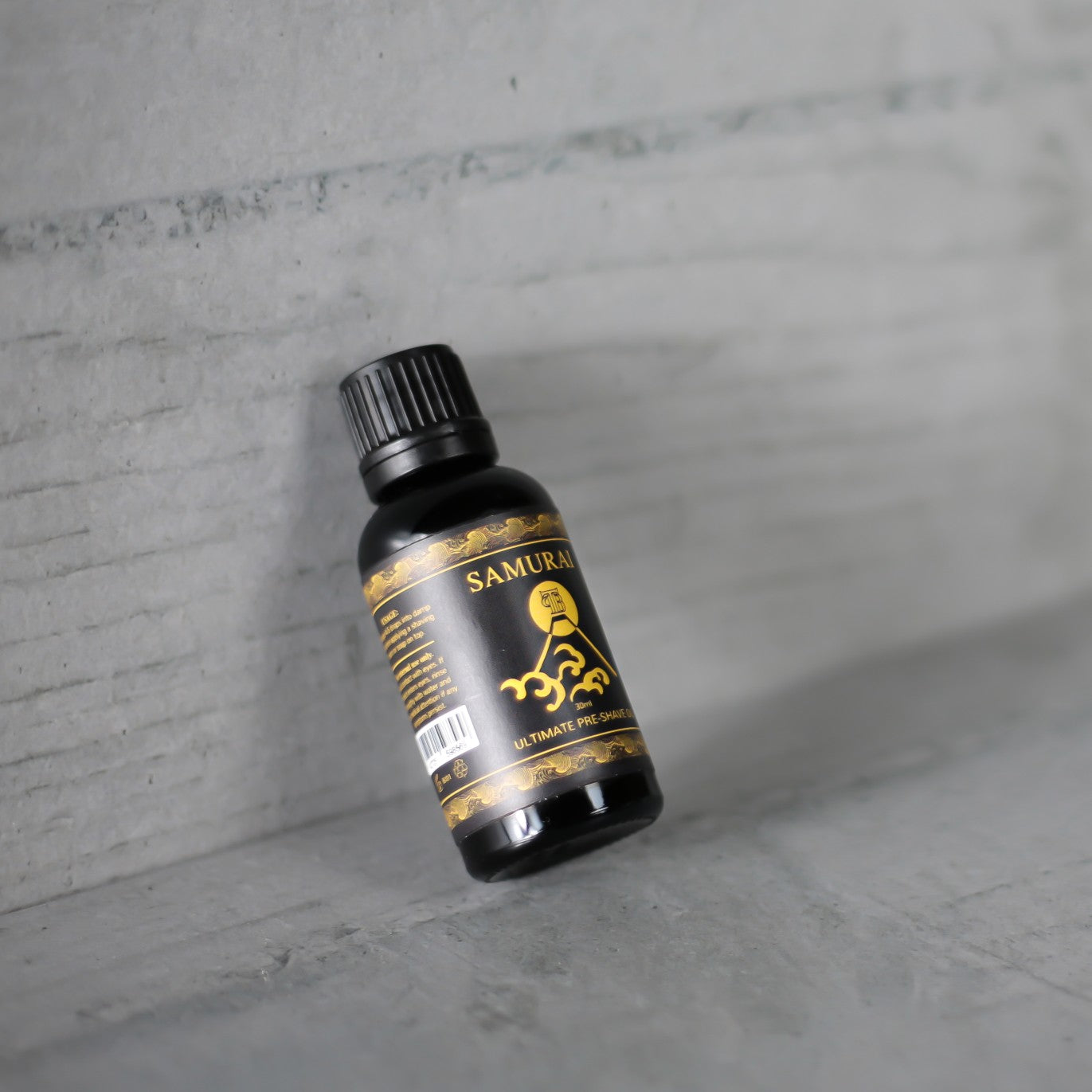 The Personal Barber Samurai Ultimate Pre-Shave Oil bottle with a sleek design, showcasing its premium quality and unique fragrance.