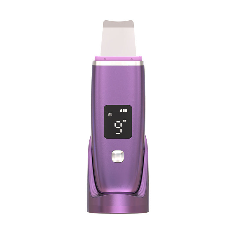 Ultrasonic Vibration Blackhead Remover with LED screen and stainless steel head, designed for deep cleansing and skincare.