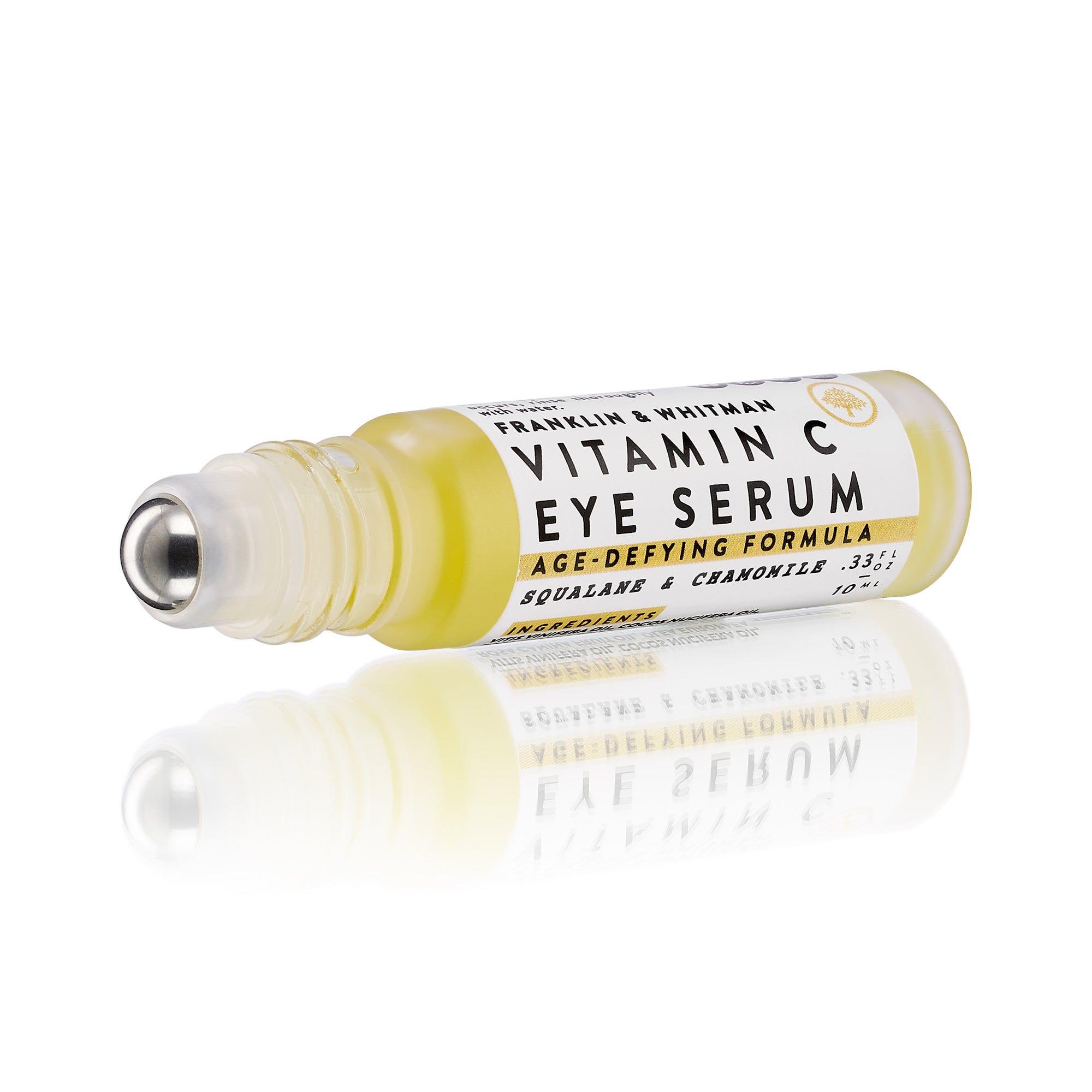 Vitamin C Eye Serum in a glass bottle with a metal roller ball, showcasing its brightening and hydrating properties.