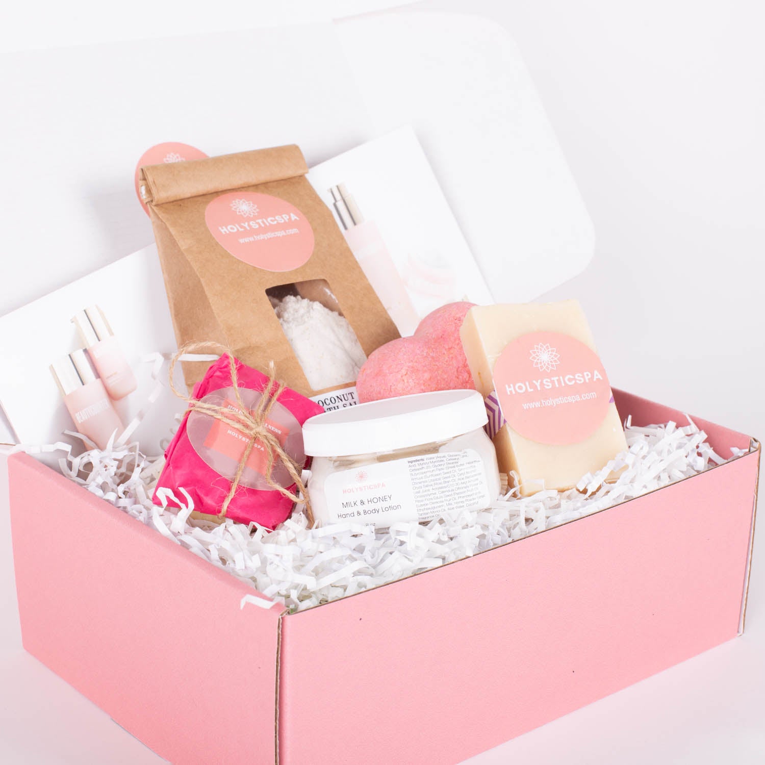 Winter Box filled with luxurious spa essentials including lotions, bath bombs, and salts for a pampering experience.