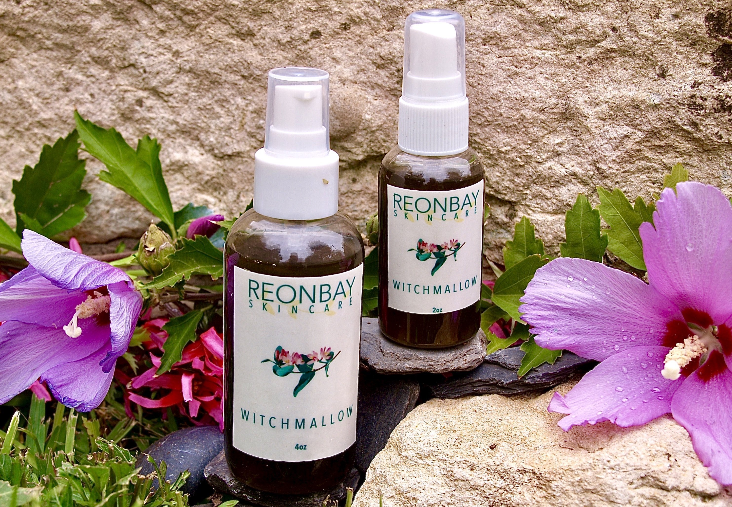 WitchMallow Serum Spray bottle with a botanical design, showcasing its natural ingredients and lightweight formula.