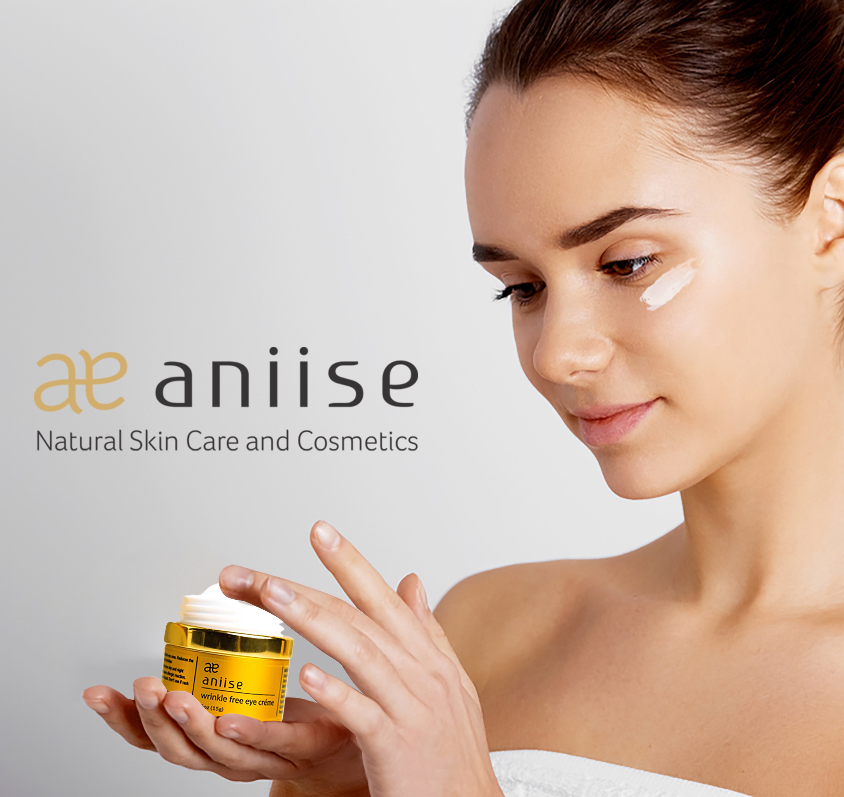 A jar of Wrinkle-Free Eye Cream with a smooth texture, surrounded by natural ingredients like Grape Seed and Green Tea.