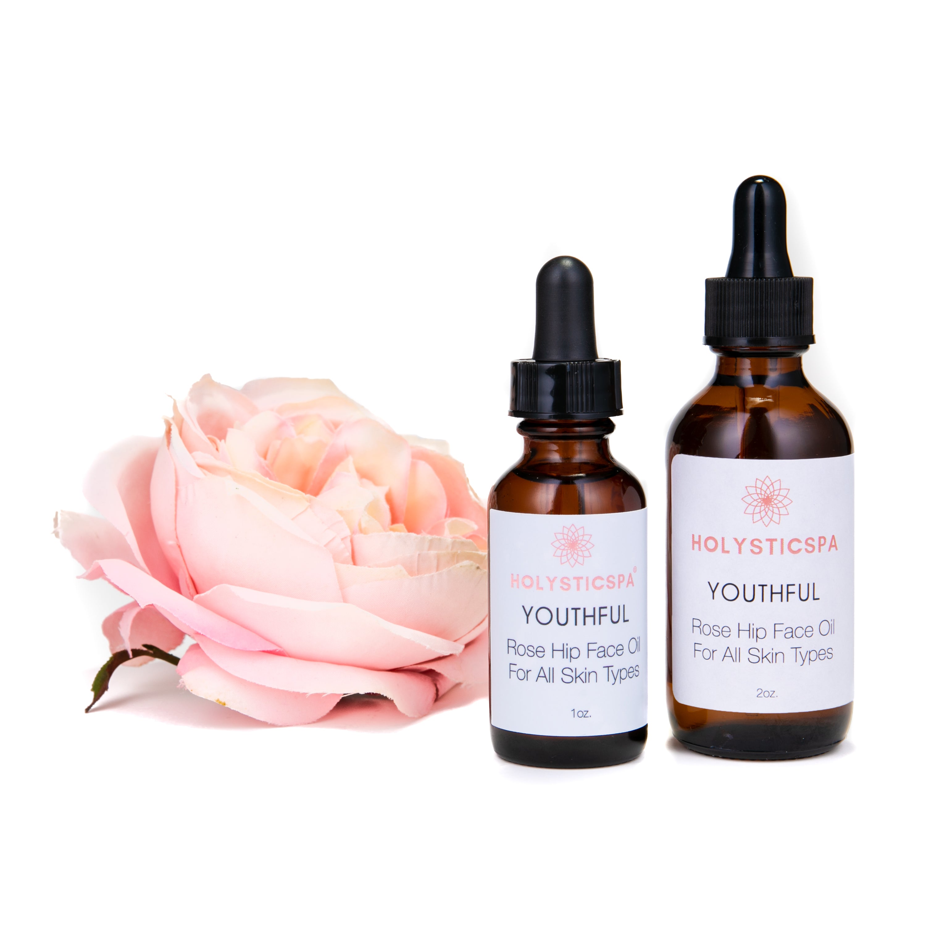 A bottle of Youthful Rosehip Face Oil with a dropper, surrounded by natural ingredients like rose hips and essential oils, showcasing its organic formulation.