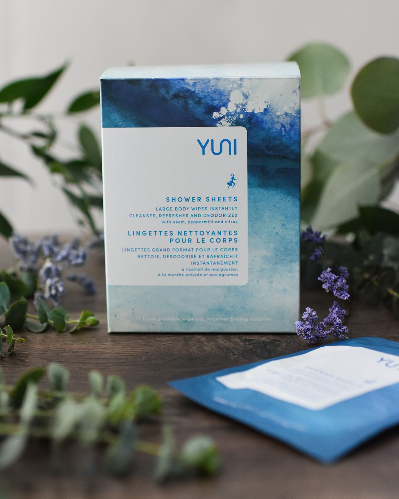 Box of YUNI shower sheets.