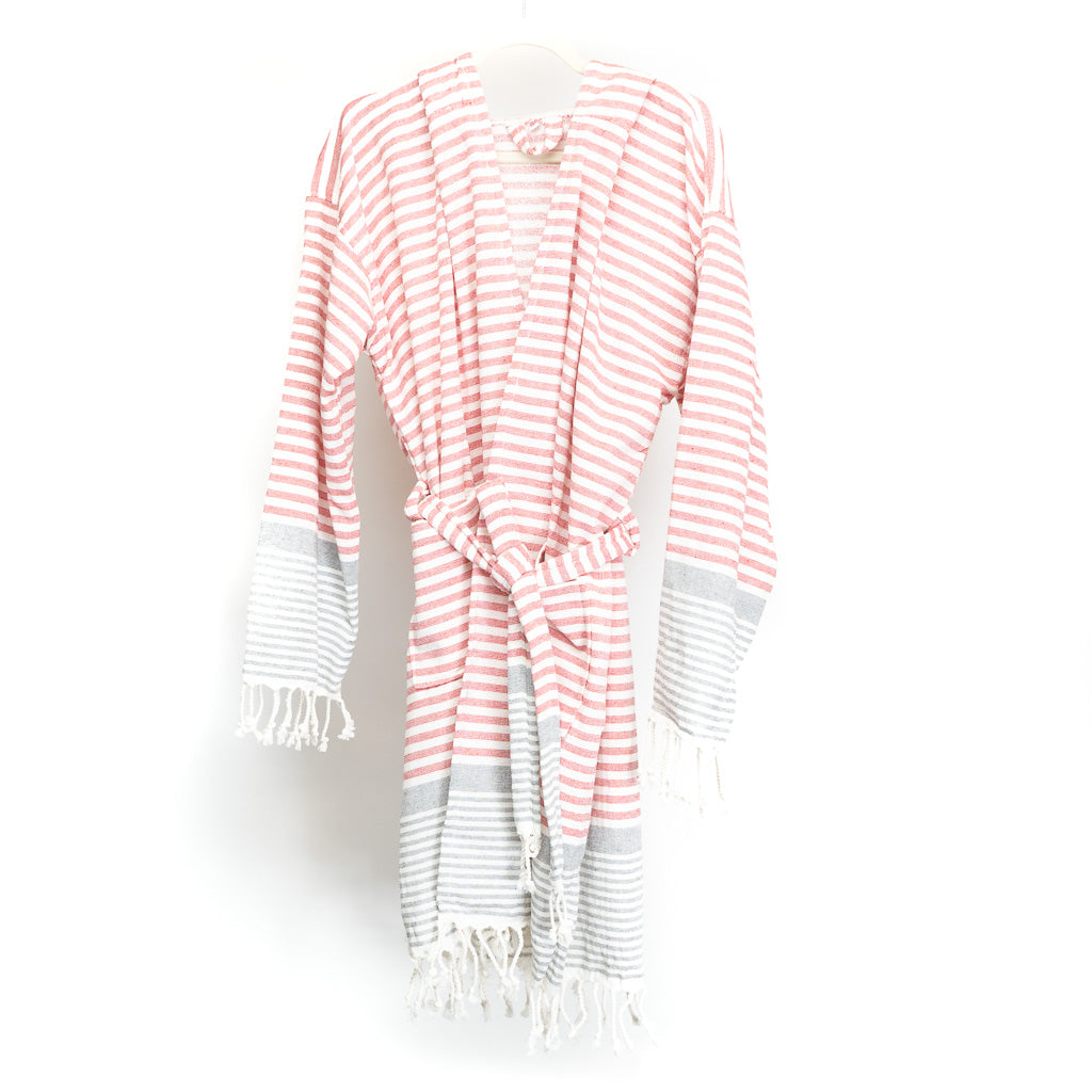 A luxurious 100% cotton peshtemal robe in vibrant red with a stylish striped design, showcasing its ultra-soft texture and absorbent quality.