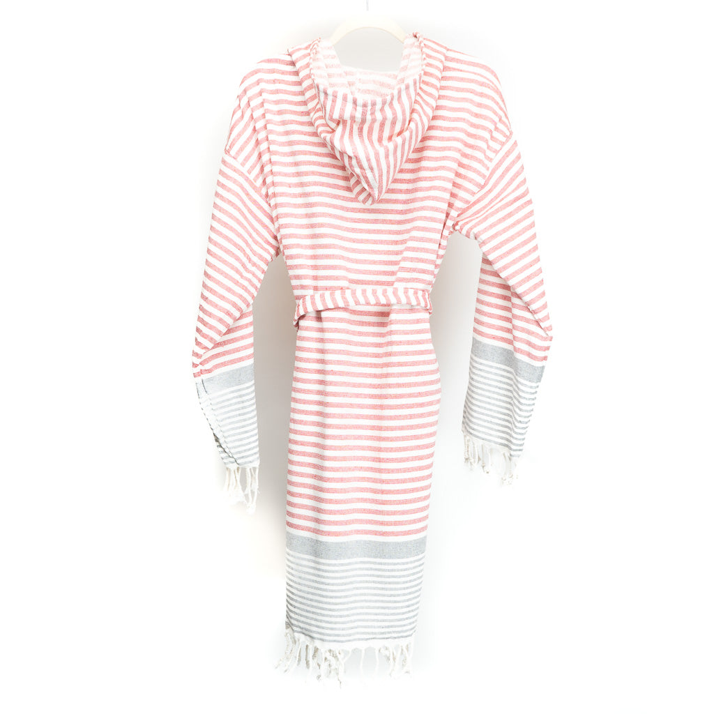 A luxurious 100% cotton peshtemal robe in vibrant red with a stylish striped design, showcasing its ultra-soft texture and absorbent quality.