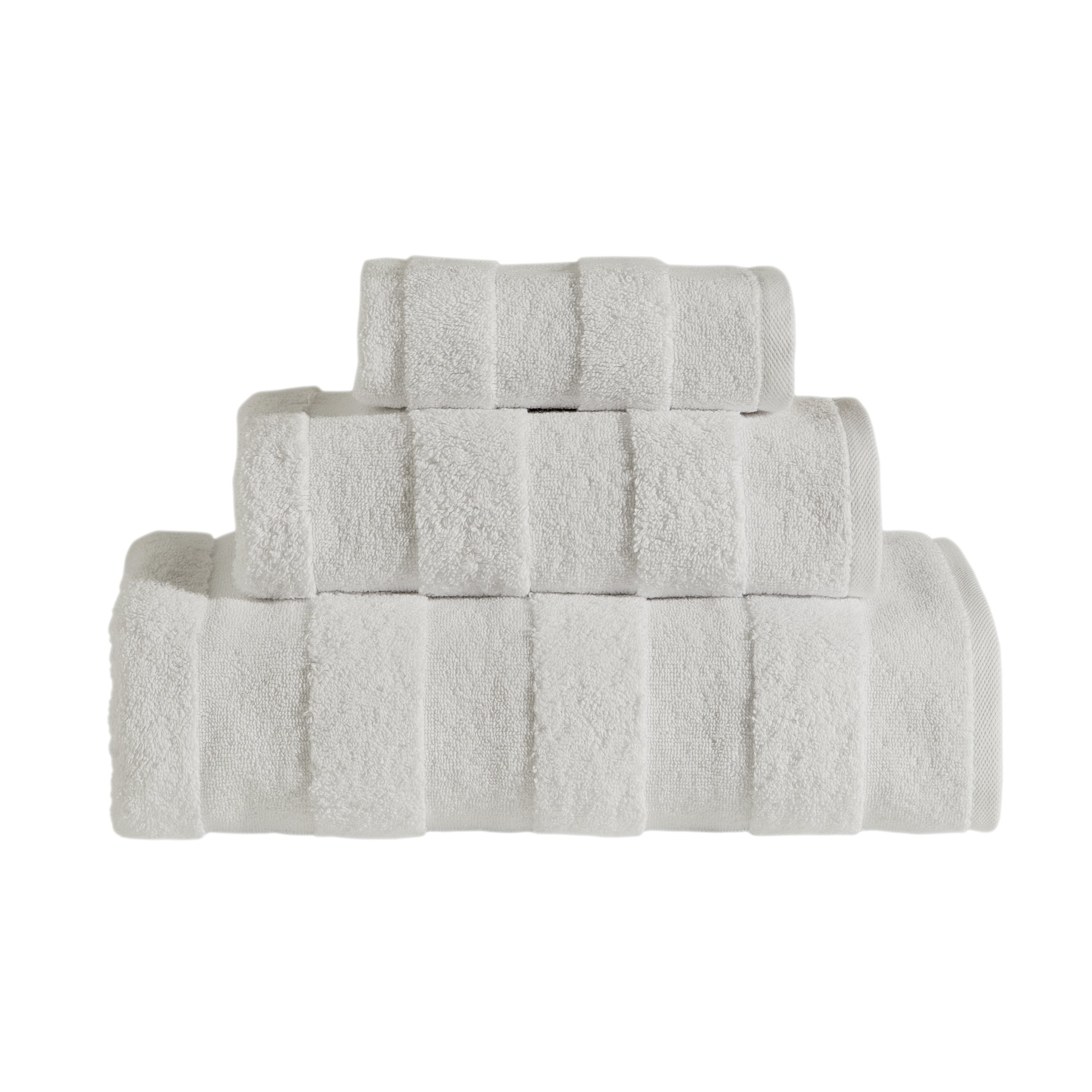 Apogee Collection Luxury Towels showcasing elegant textures and soft cotton fabric in various sizes.