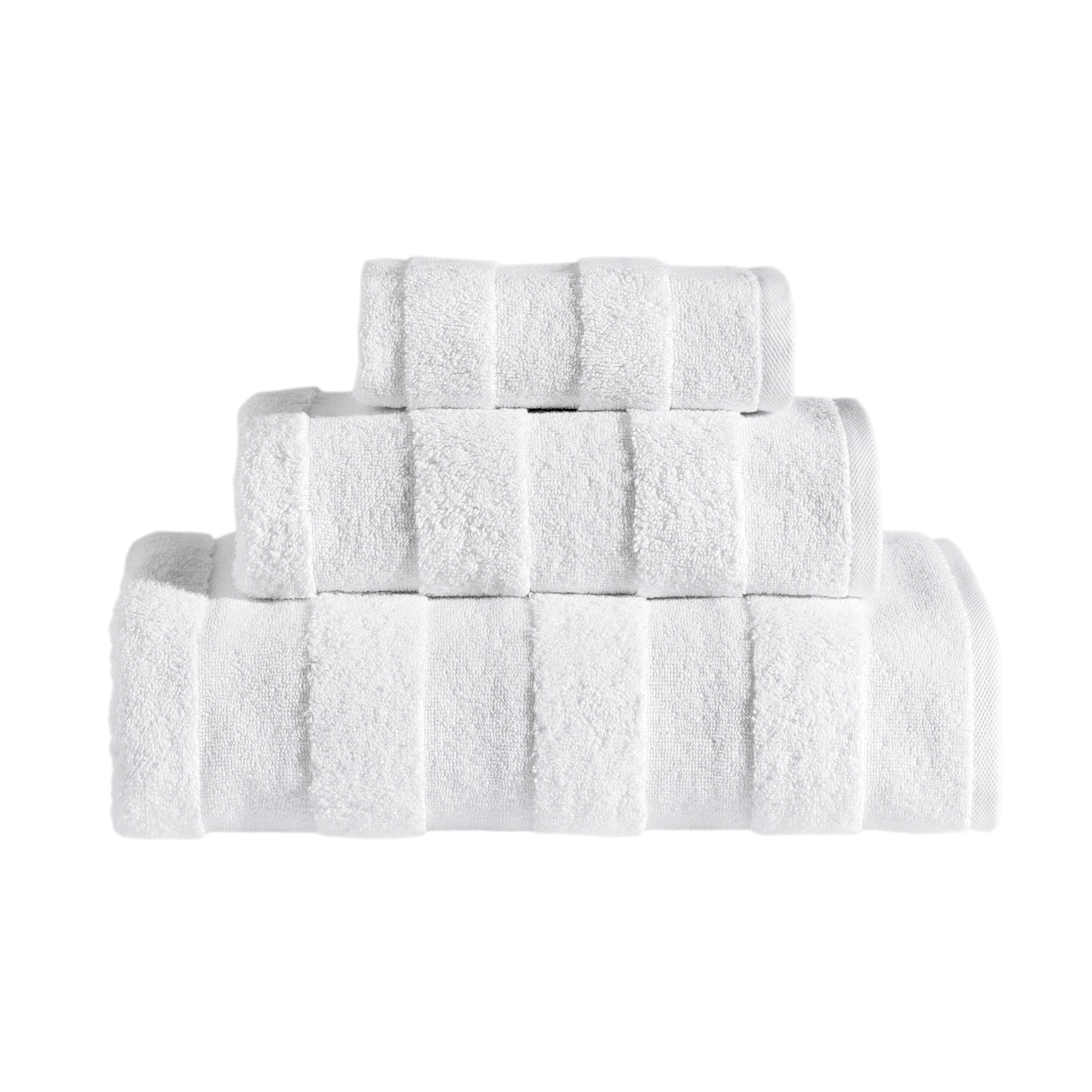 Apogee Collection Luxury Towels showcasing elegant textures and soft cotton fabric in various sizes.