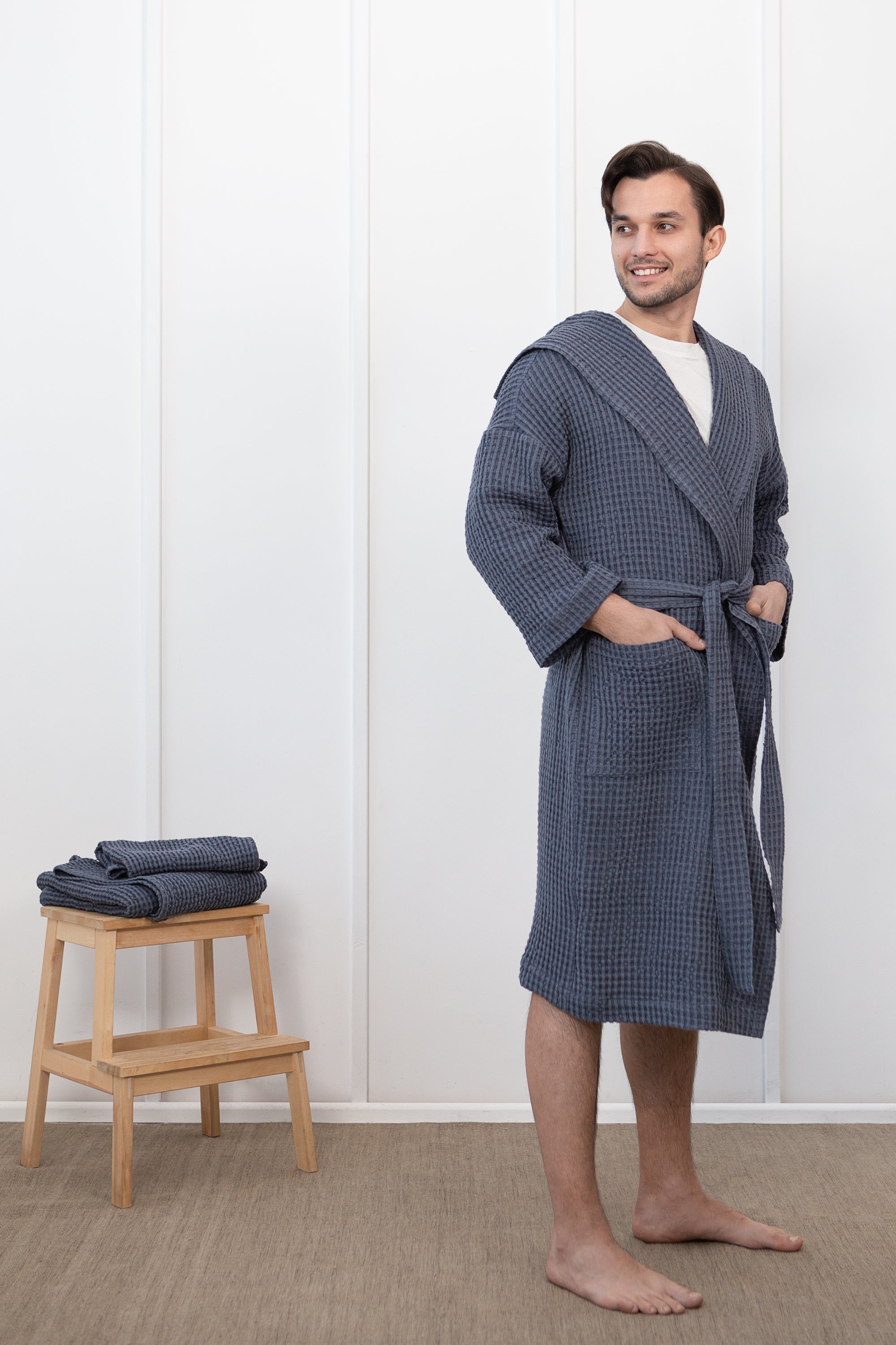 Asphalt Grey linen waffle robe with a cozy hoodie, featuring a soft texture and two front pockets, displayed elegantly.