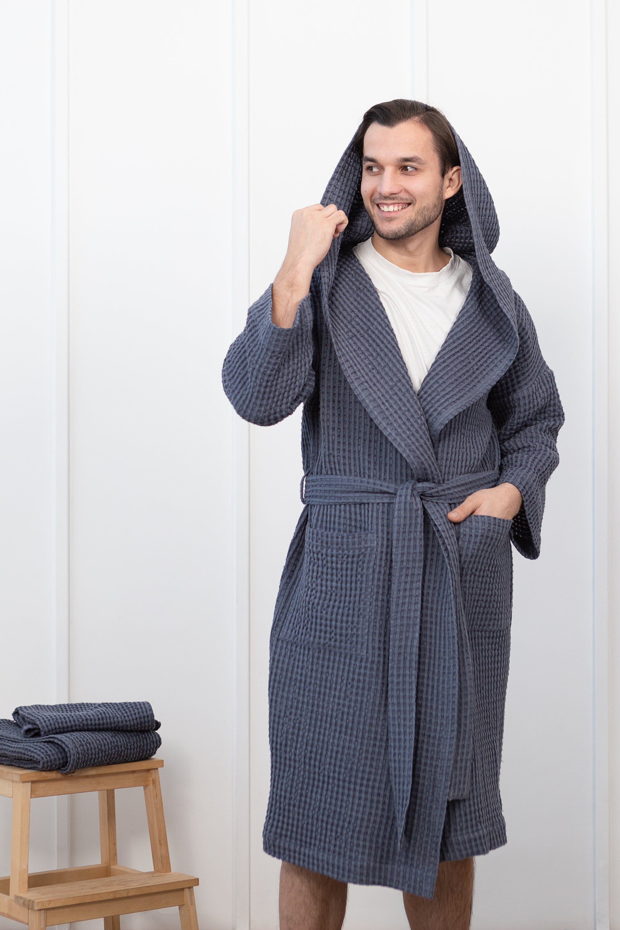 Asphalt Grey linen waffle robe with a cozy hoodie, featuring a soft texture and two front pockets, displayed elegantly.