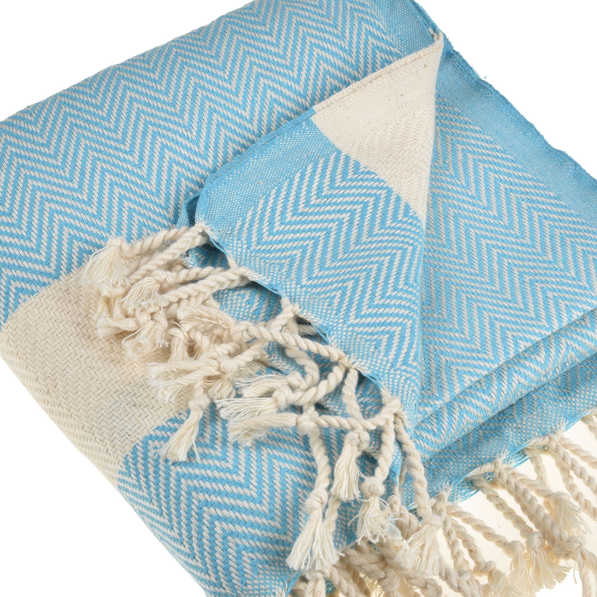 Herring Beach Towel in vibrant colors, showcasing its soft cotton texture and large size, ideal for beach and outdoor use.