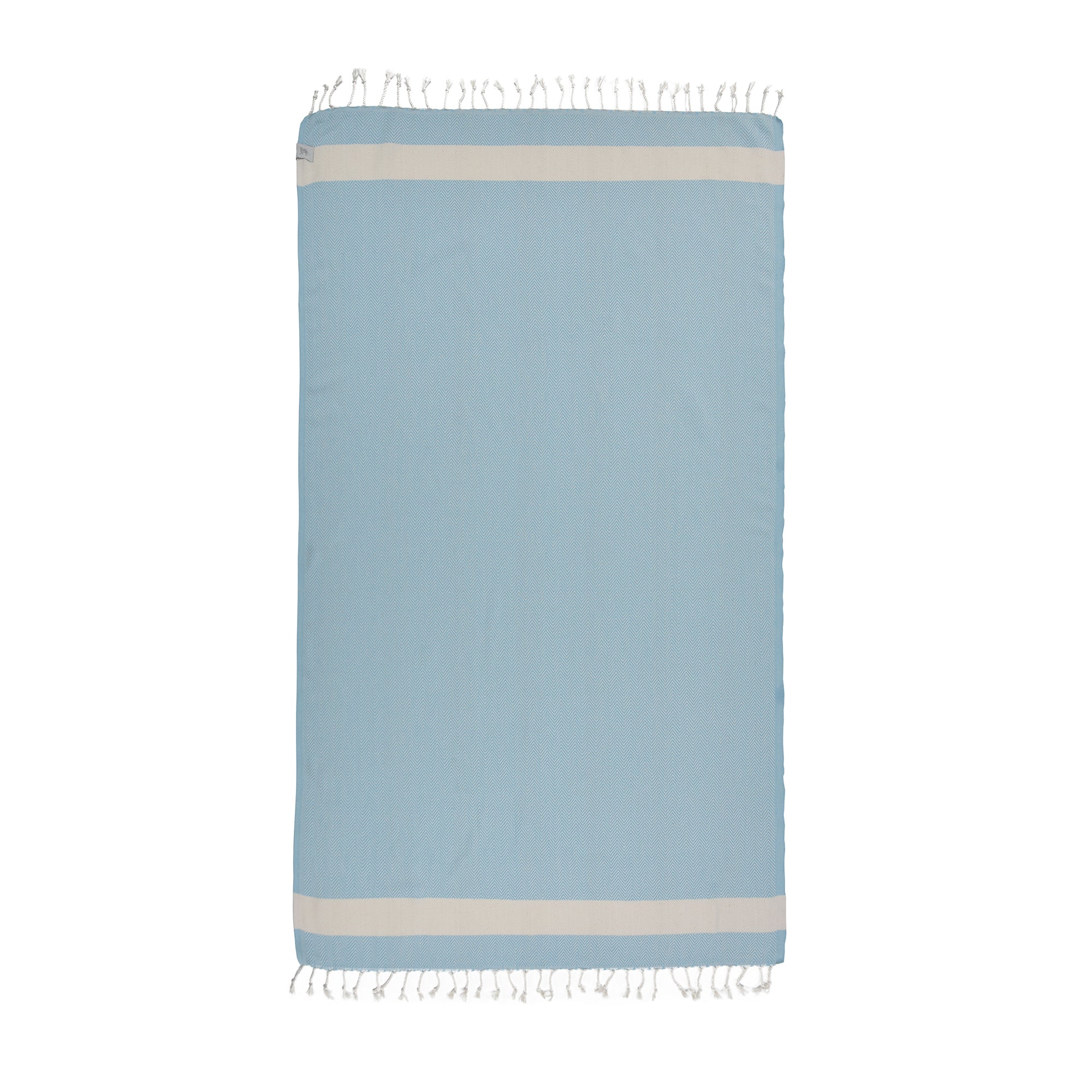 Herring Beach Towel in vibrant colors, showcasing its soft cotton texture and large size, ideal for beach and outdoor use.