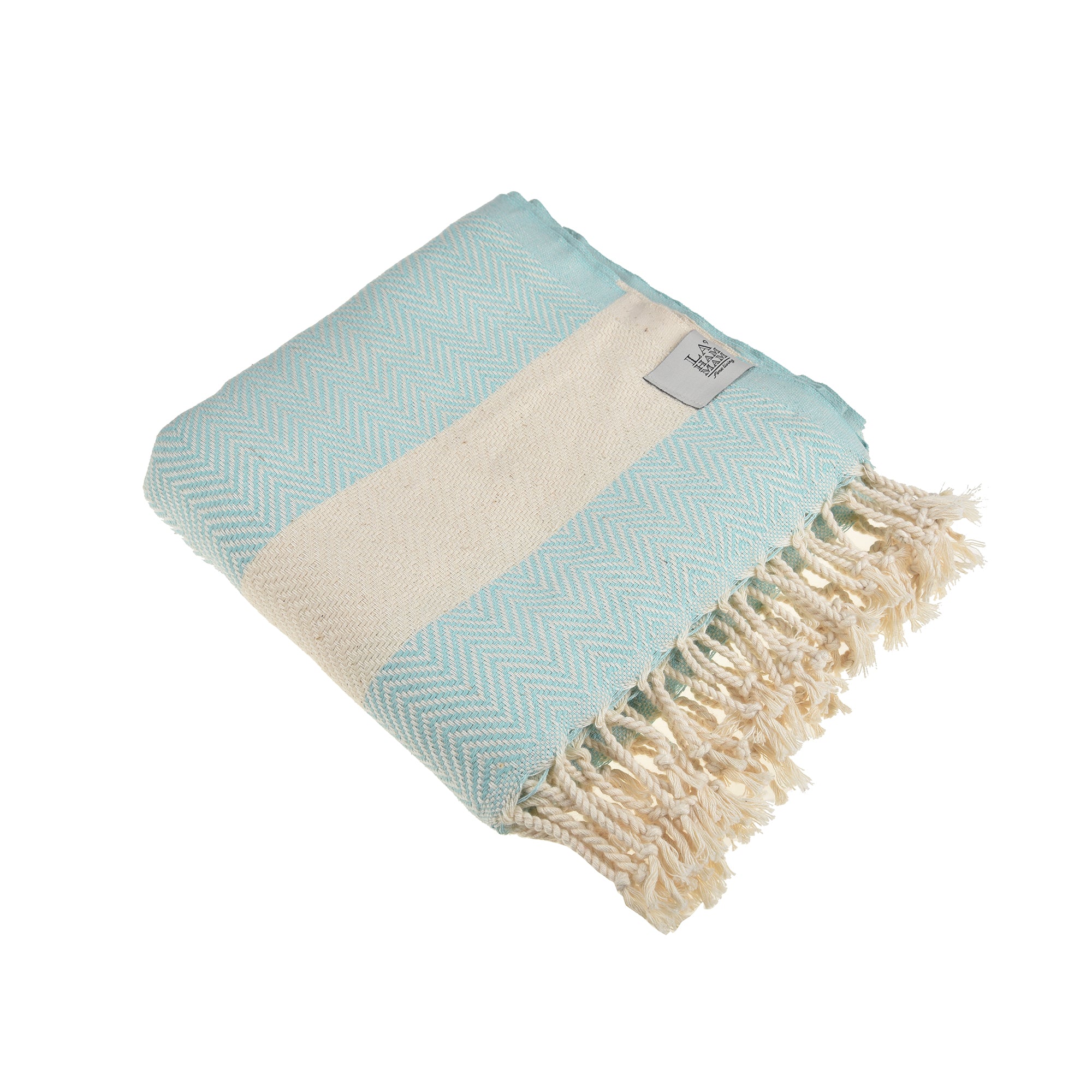 Herring Beach Towel in vibrant colors, showcasing its soft cotton texture and large size, ideal for beach and outdoor use.