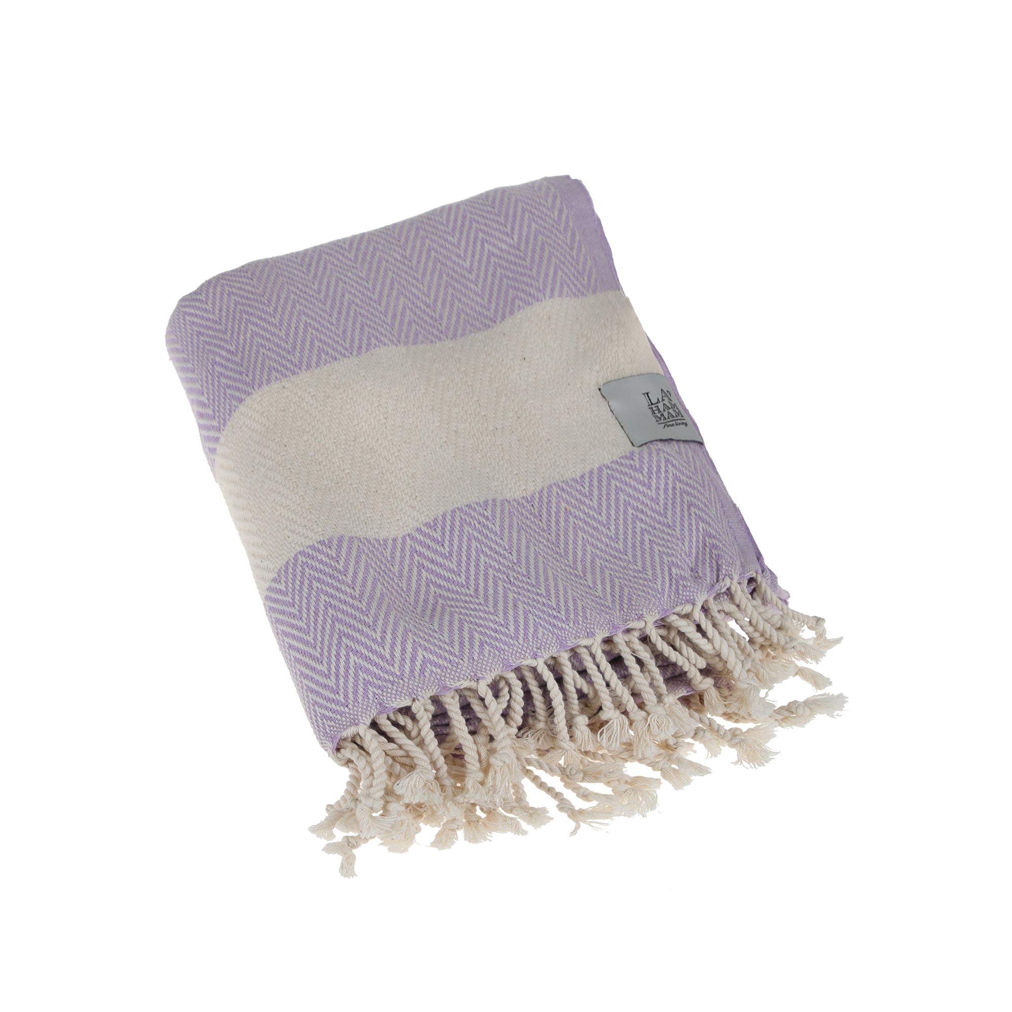 Herring Beach Towel in vibrant colors, showcasing its soft cotton texture and large size, ideal for beach and outdoor use.