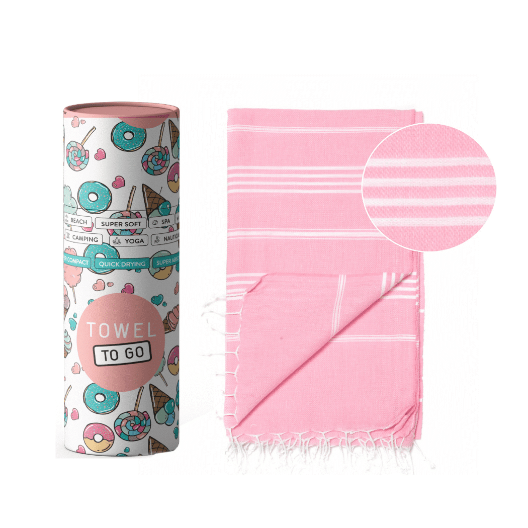 Ipanema Hammam Turkish Towel in pink, beautifully packaged in a recycled gift box, showcasing its soft cotton texture.