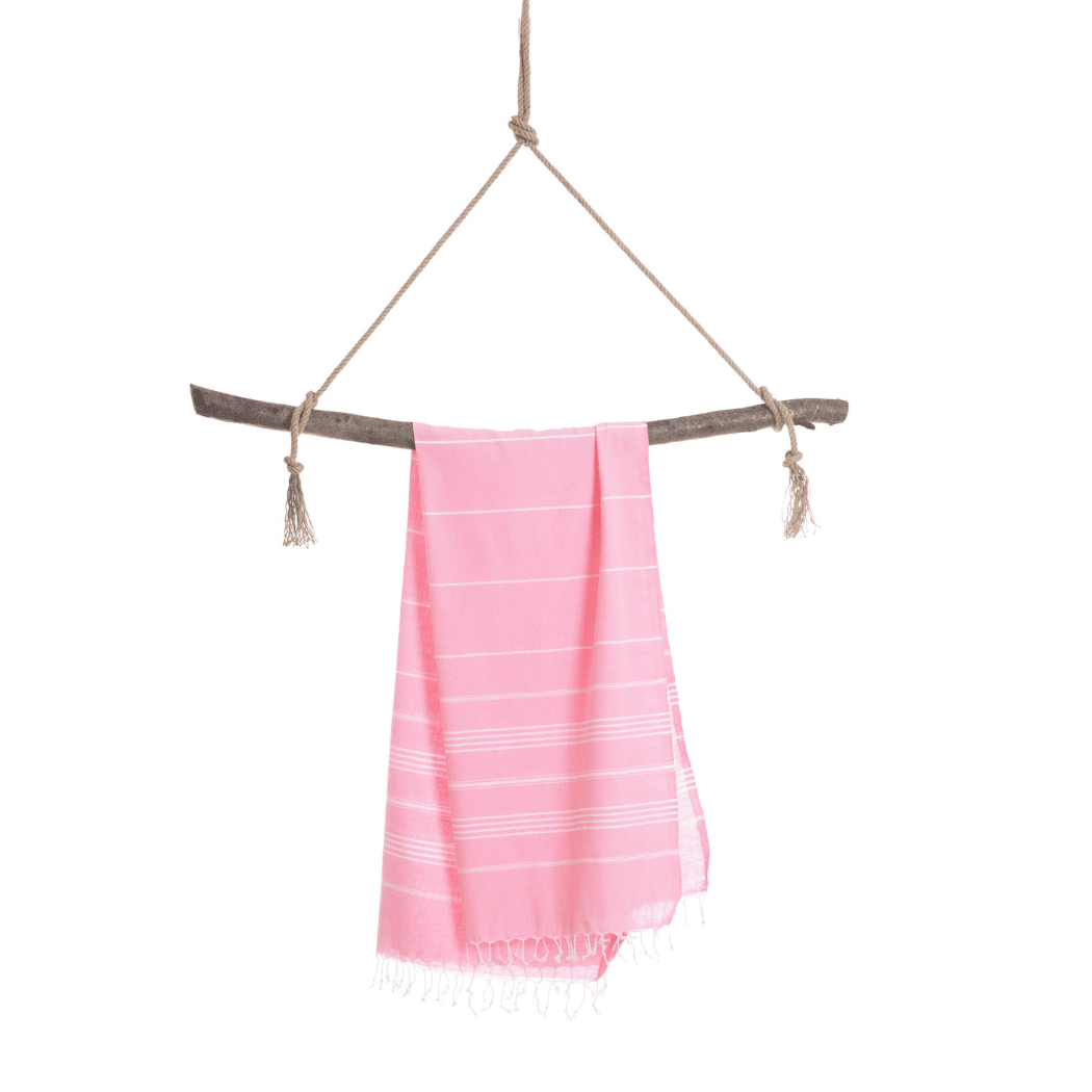 Ipanema Hammam Turkish Towel in pink, beautifully packaged in a recycled gift box, showcasing its soft cotton texture.