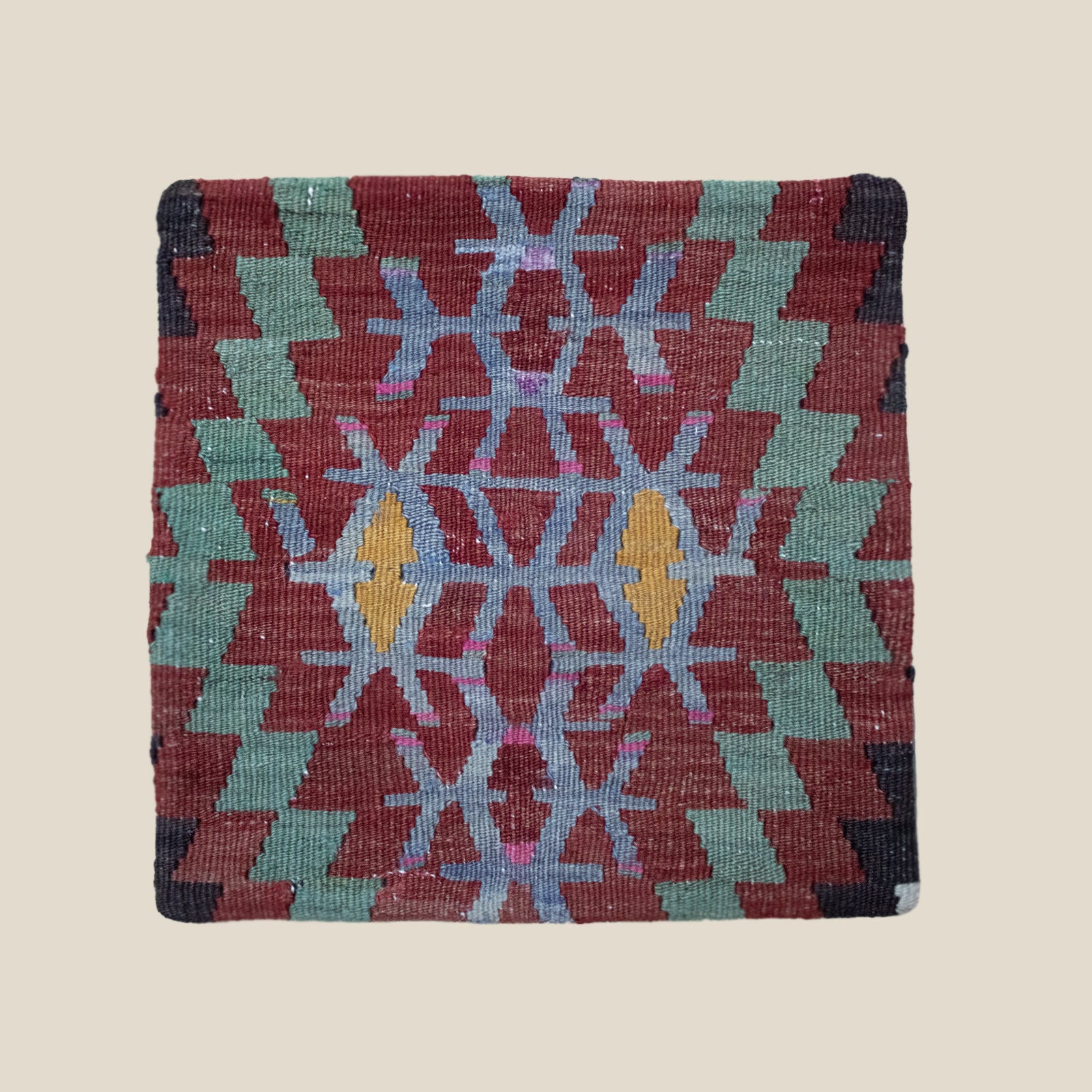 Kilim Cushion Nuri featuring vibrant vintage patterns from Turkish kilims, with a sturdy cotton canvas back.