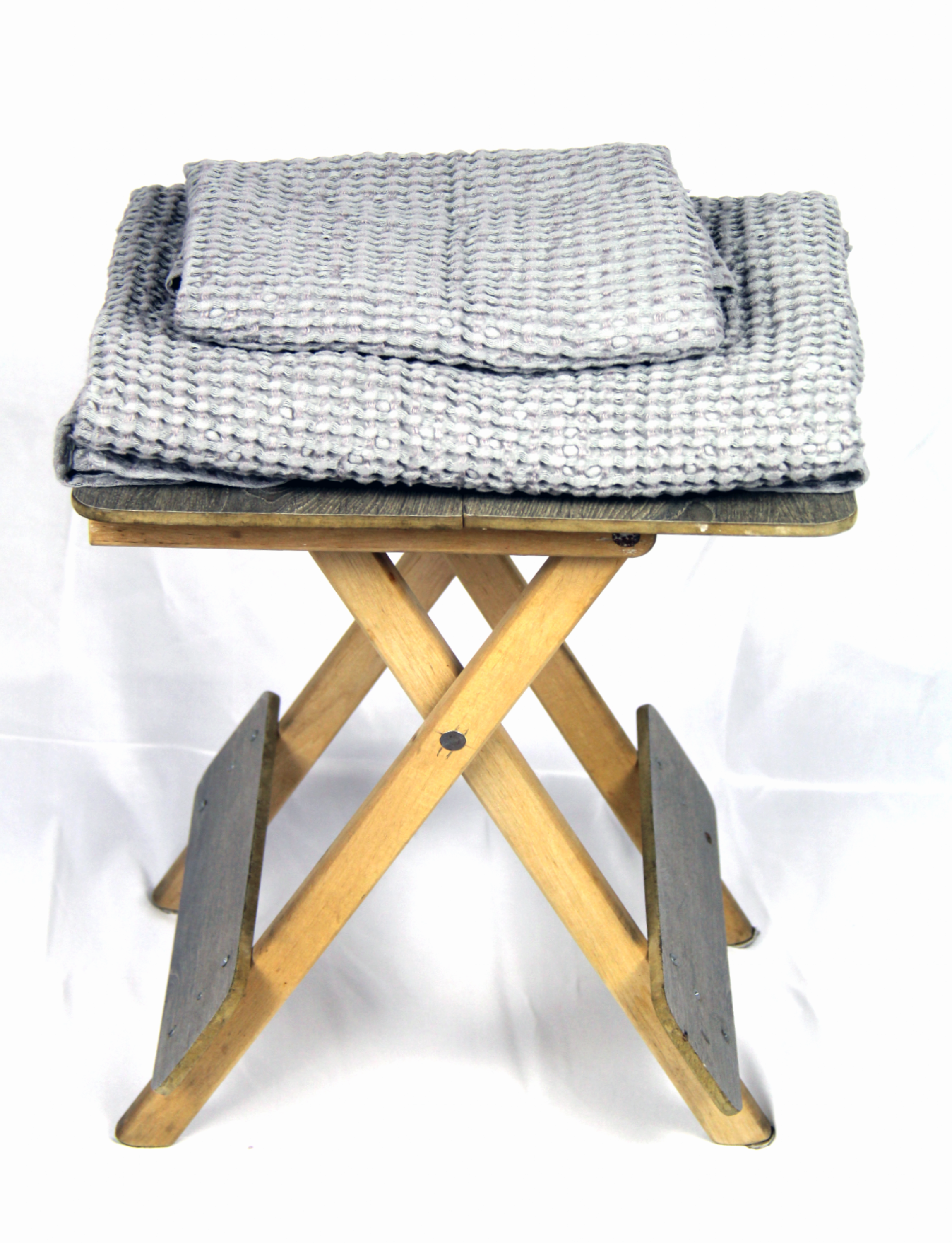 Light Grey linen waffle towel showcasing its unique texture and soft fabric, perfect for luxurious bathing experiences.