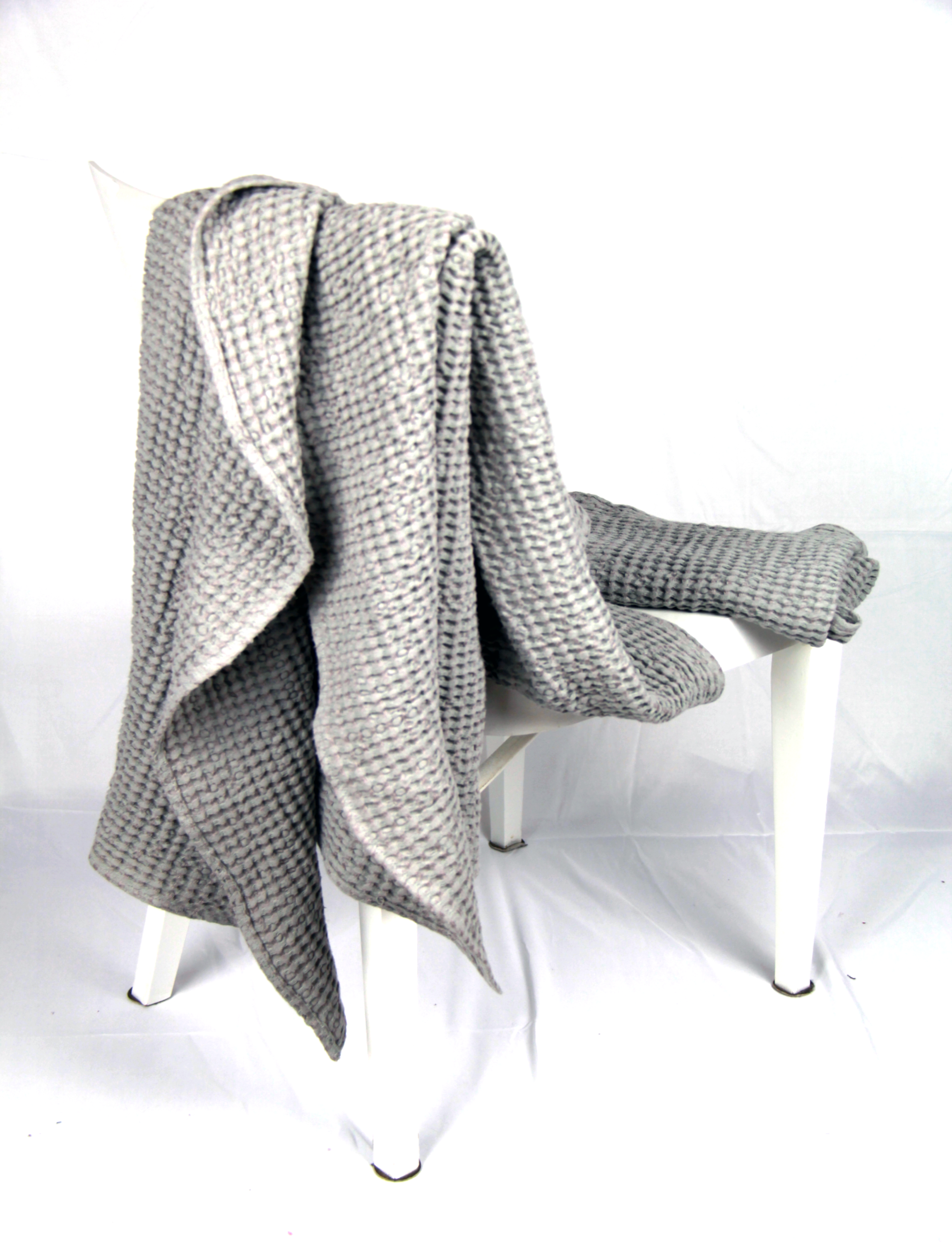 Light Grey linen waffle towel showcasing its unique texture and soft fabric, perfect for luxurious bathing experiences.