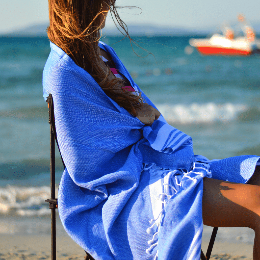 Malibu Hammam Towel in black, made from 100% cotton, displayed in a recycled gift box, showcasing its stylish and eco-friendly design.