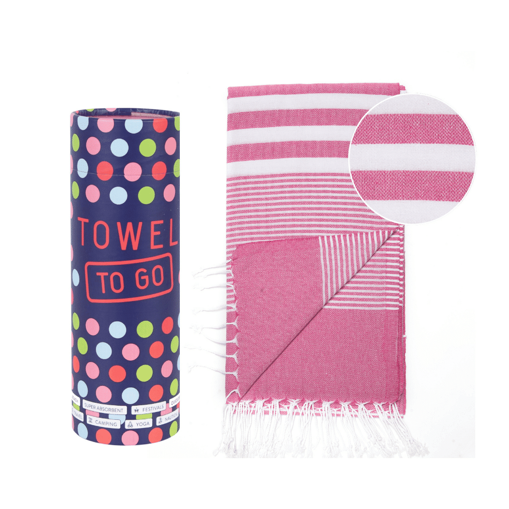 Fuchsia Malibu Hammam Towel displayed in a recycled gift box, showcasing its vibrant color and eco-friendly packaging.