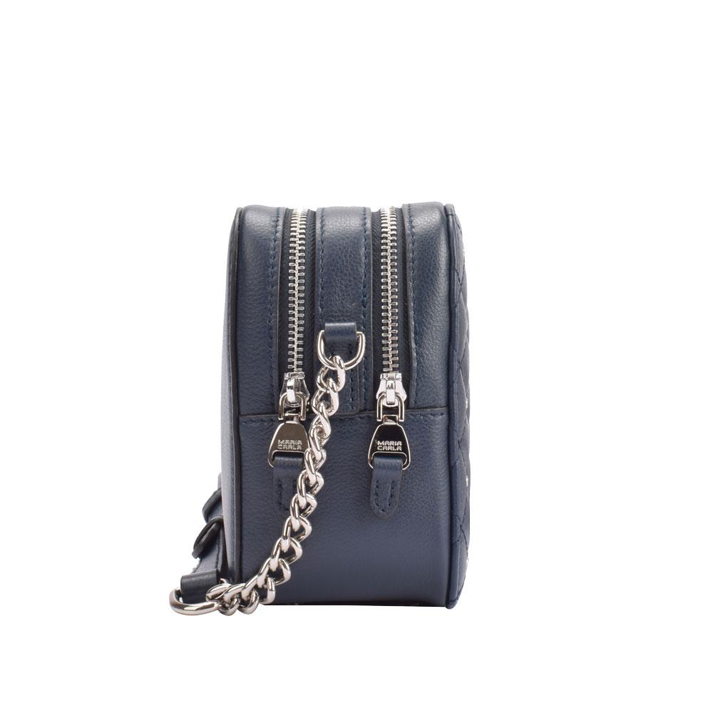 Maria Carla luxury leather handbag in navy with soft quilted texture, adjustable chain strap, and silver metal detailing.