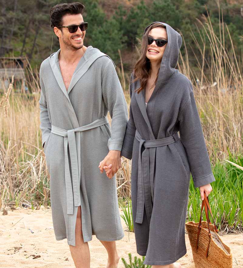 Men's Hooded Turkish Cotton Waffle Robe in various colors, showcasing its soft texture and stylish design.