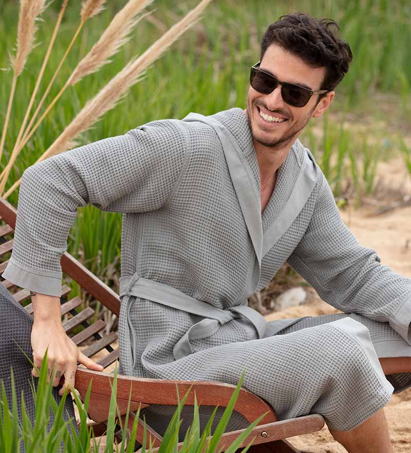 Men's Hooded Turkish Cotton Waffle Robe in various colors, showcasing its soft texture and stylish design.