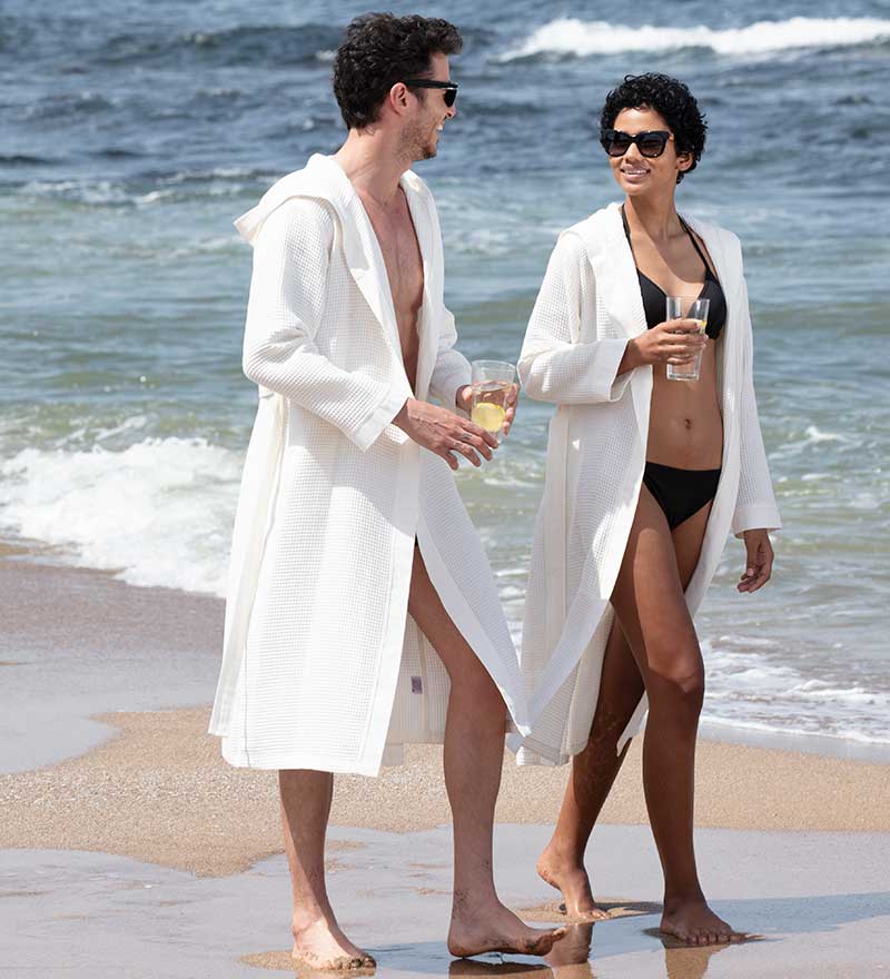 Men's Hooded Turkish Cotton Waffle Robe in various colors, showcasing its soft texture and stylish design.