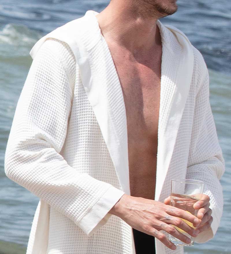 Men's Hooded Turkish Cotton Waffle Robe in various colors, showcasing its soft texture and stylish design.