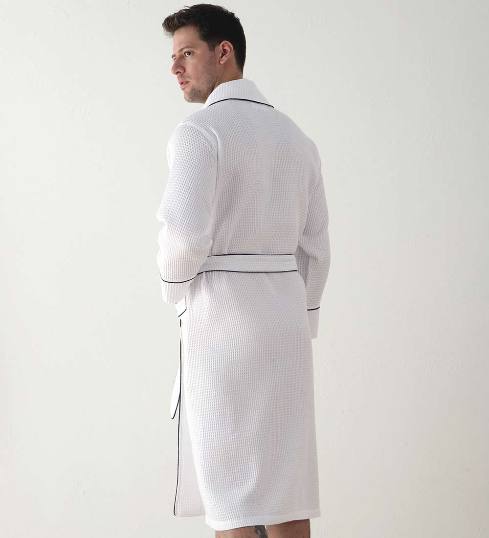 Men's Luxury Waffle Hotel Robe in various colors, showcasing its soft texture and stylish design with shawl collar and pockets.