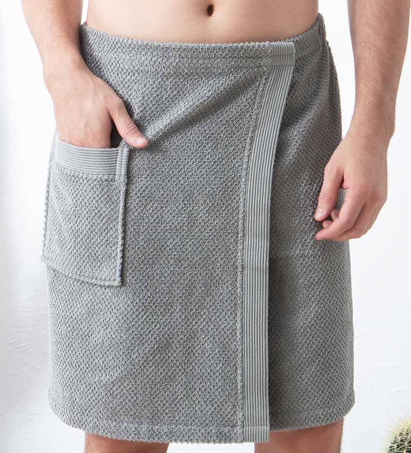 Men's Turkish Cotton Towel Wrap in various colors, showcasing its adjustable velcro closure and pocket feature.