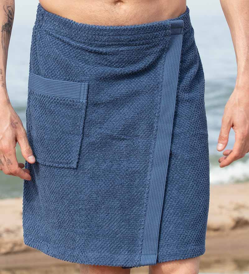 Men's Turkish Cotton Towel Wrap in various colors, showcasing its adjustable velcro closure and pocket feature.