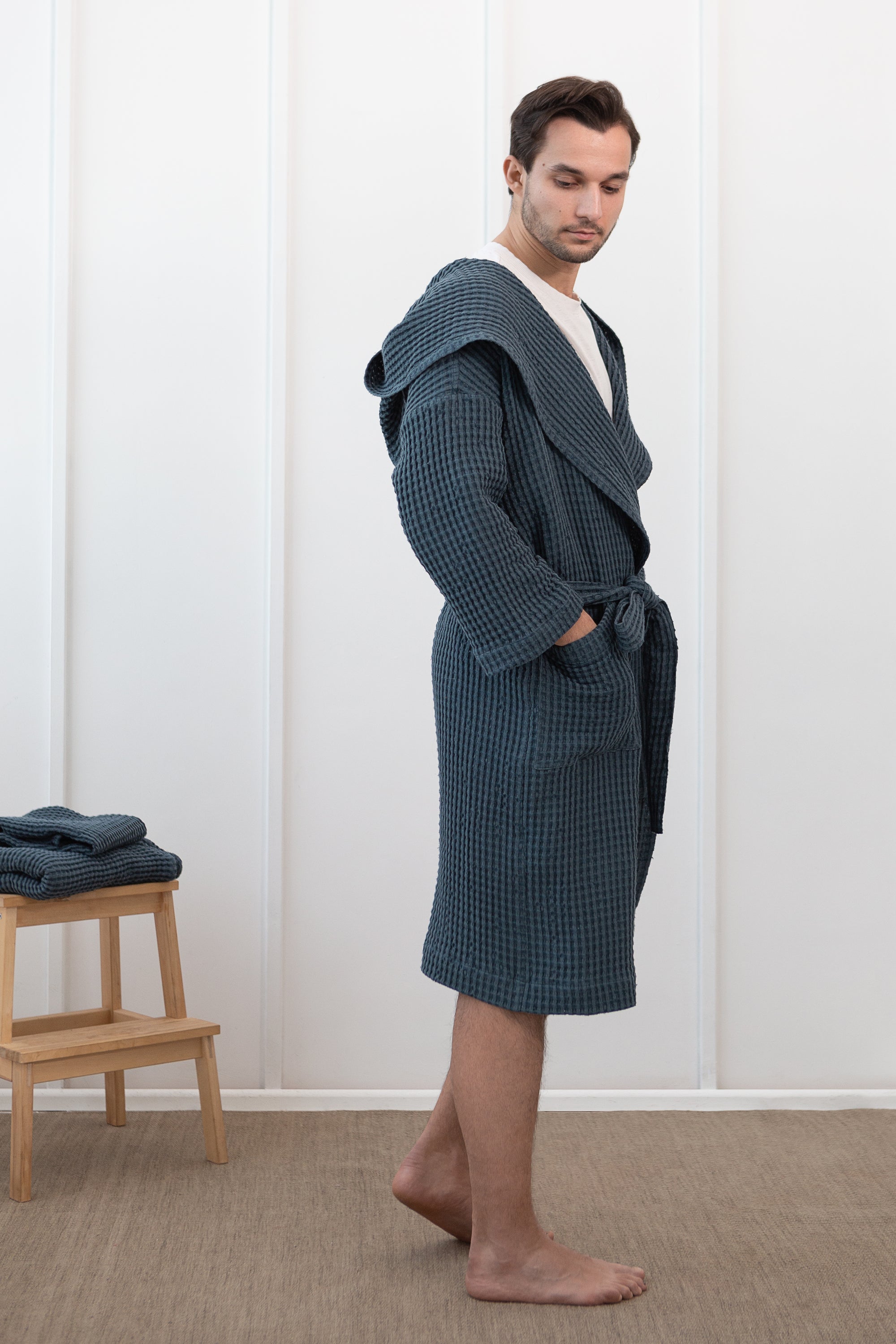 Navy Blue linen waffle robe with a cozy hoodie, showcasing its soft texture and stylish design, perfect for relaxation.