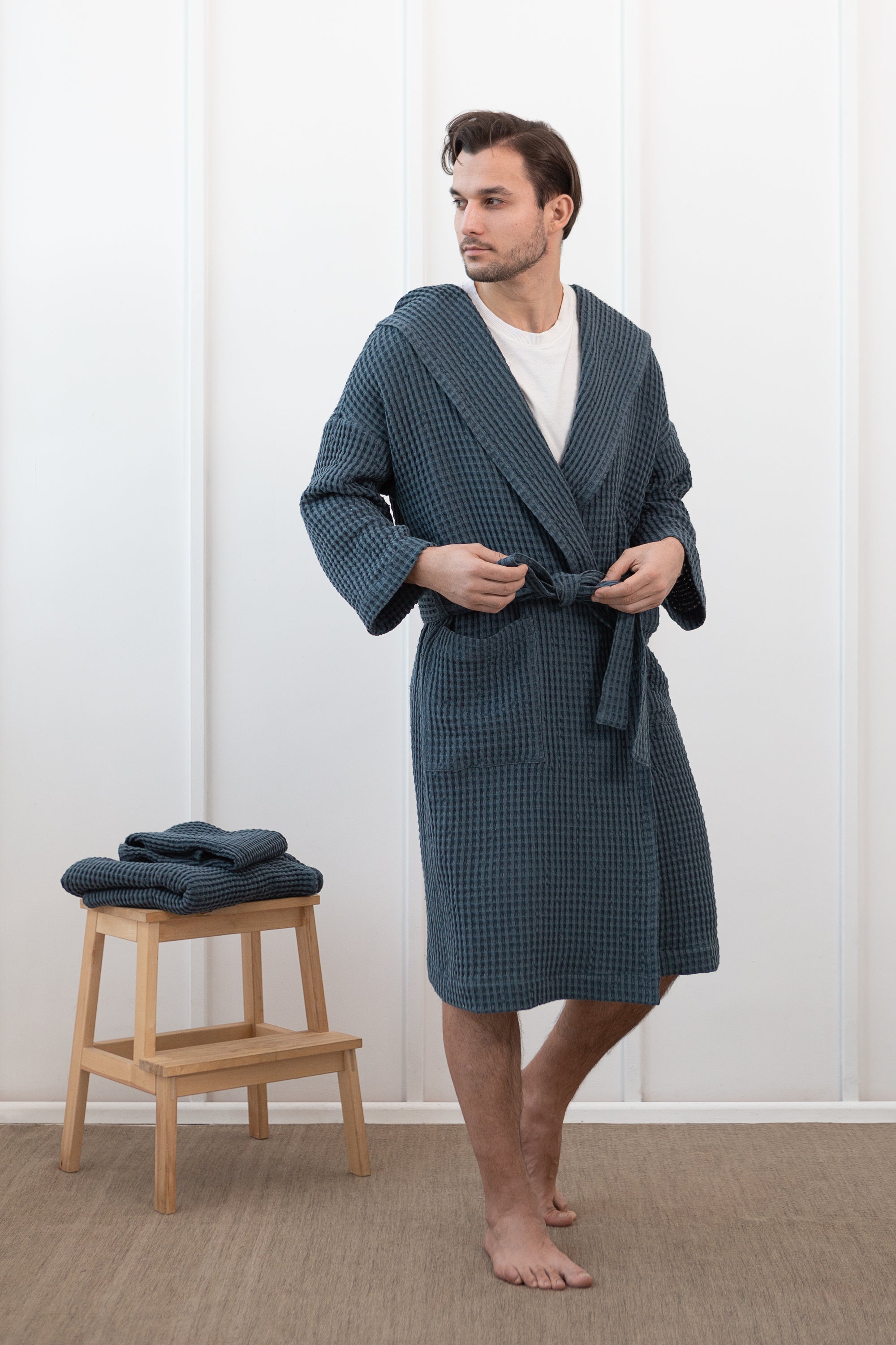 Navy Blue linen waffle robe with a cozy hoodie, showcasing its soft texture and stylish design, perfect for relaxation.