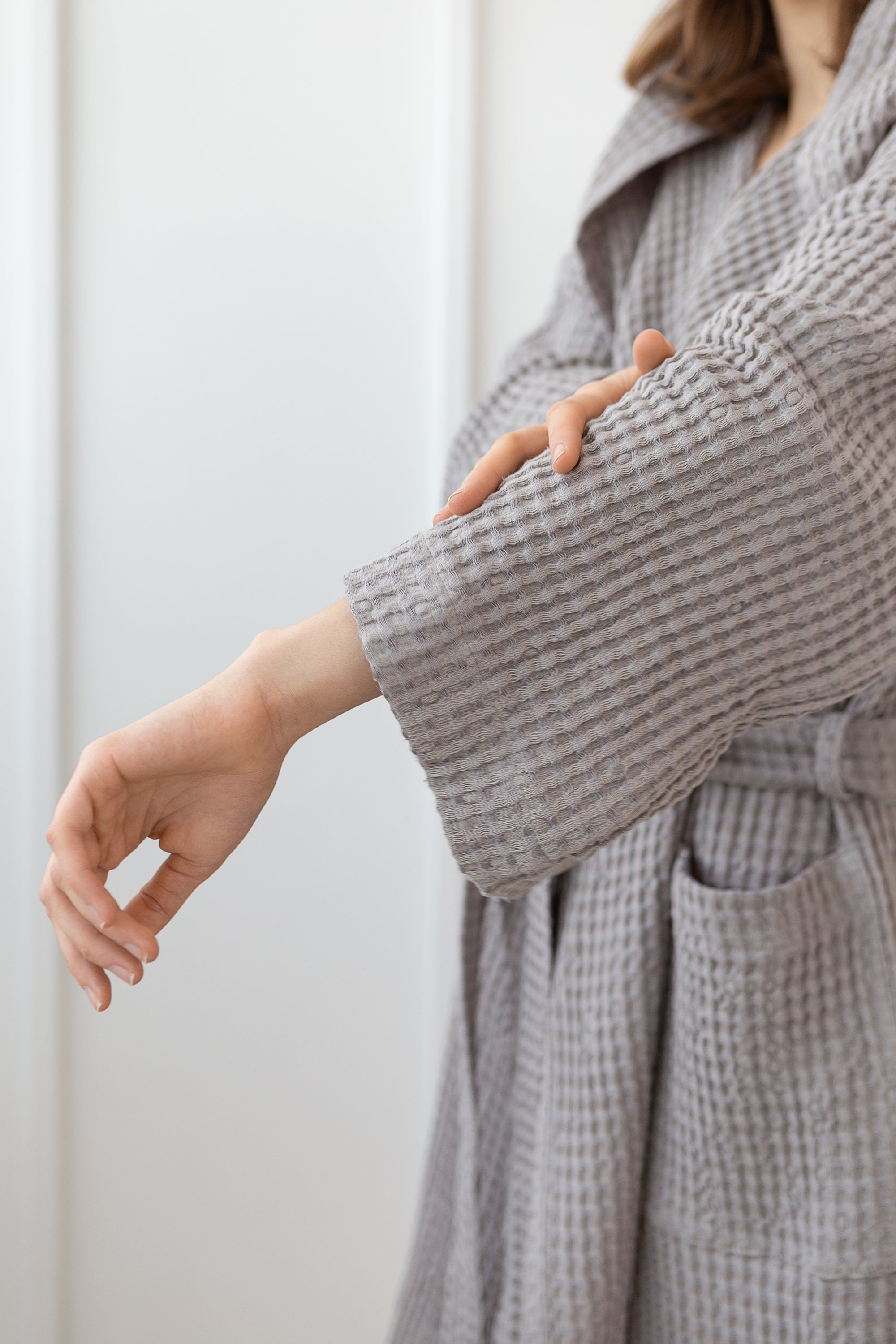 Navy Blue linen waffle robe with a cozy hoodie, showcasing its soft texture and stylish design, perfect for relaxation.