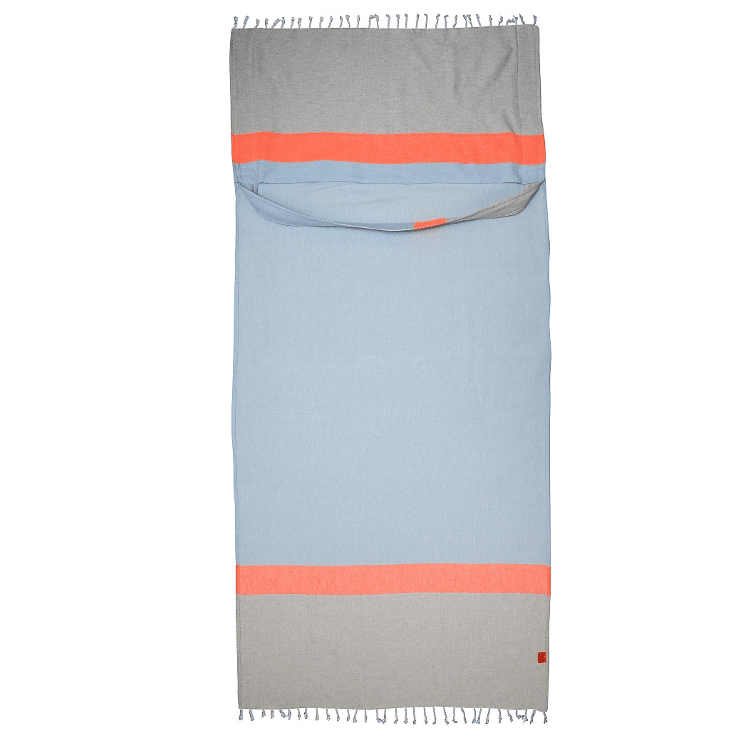 Neon Two-in-One Beach Towel and Bag in blue and grey, made from recycled cotton, showcasing its stylish design and functionality.