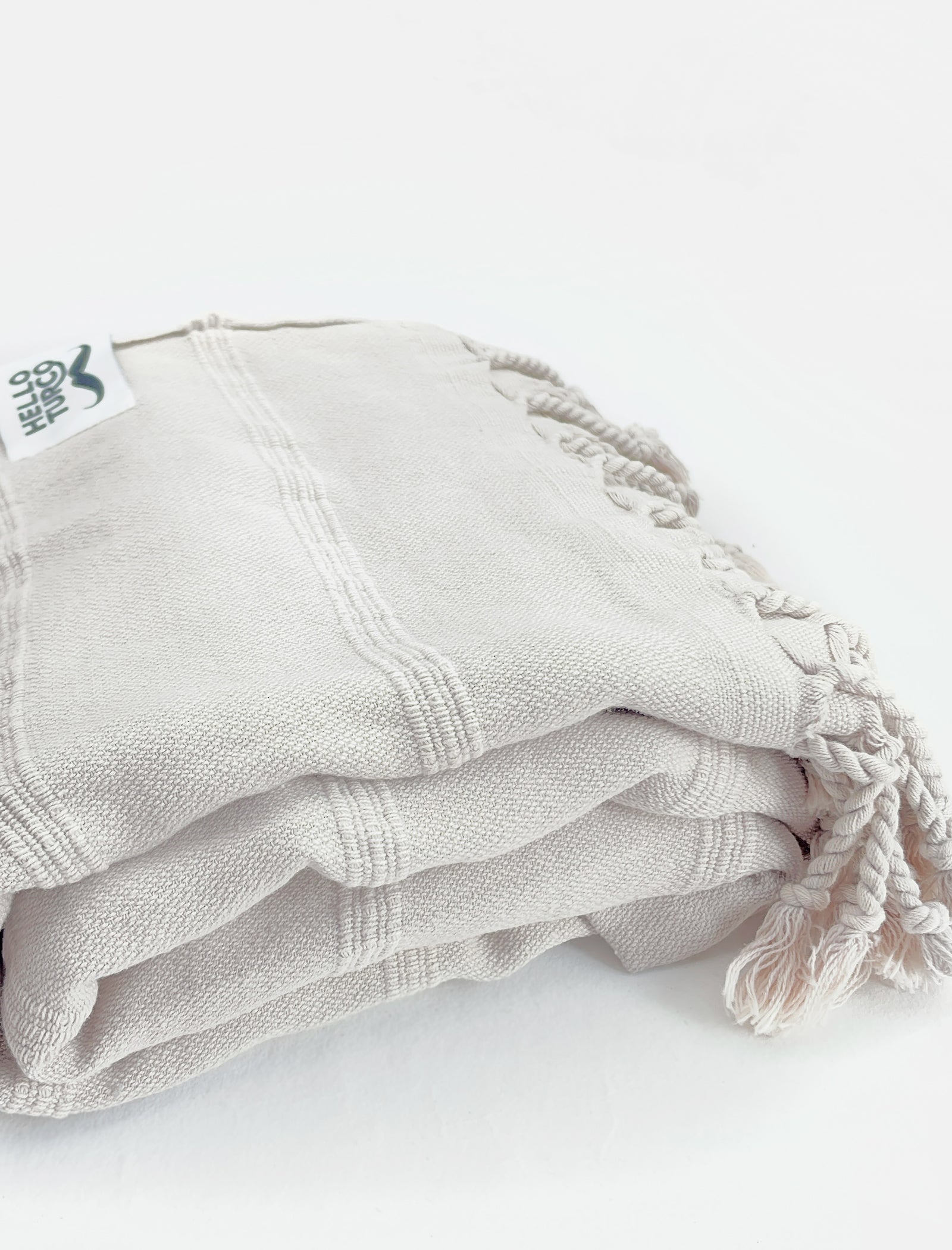 No Make Up Stonewashed towel in soft beige color, showcasing its stonewashed texture and versatility for various uses.