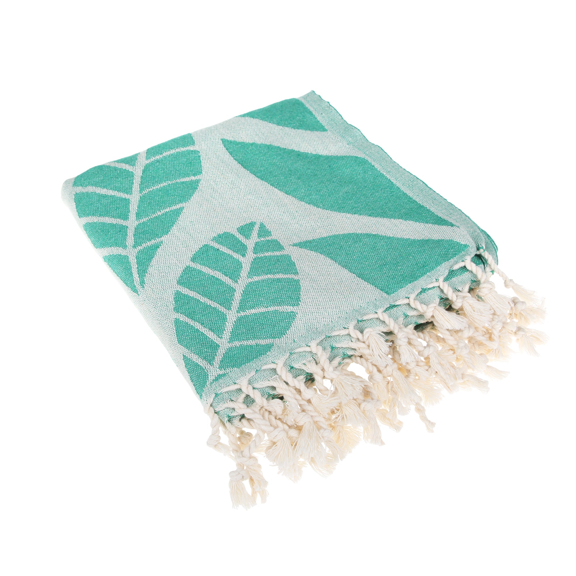 A vibrant Seaweed Pure Cotton Throw Beach Towel displayed on a sandy beach, showcasing its soft texture and traditional woven design.