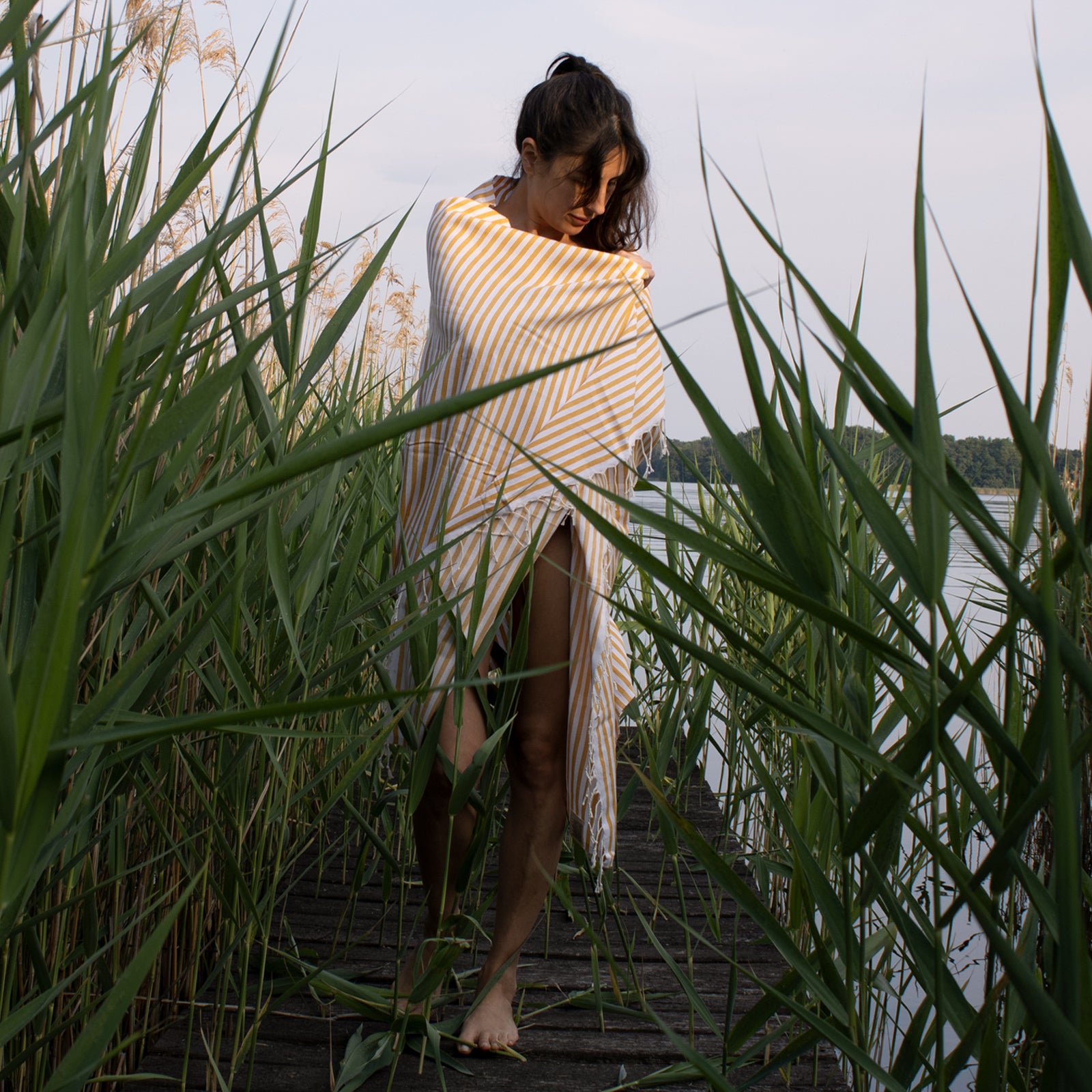 Soni Turkish Towel featuring a classic black striped design, made of 100% organic cotton, perfect for beach and spa use.