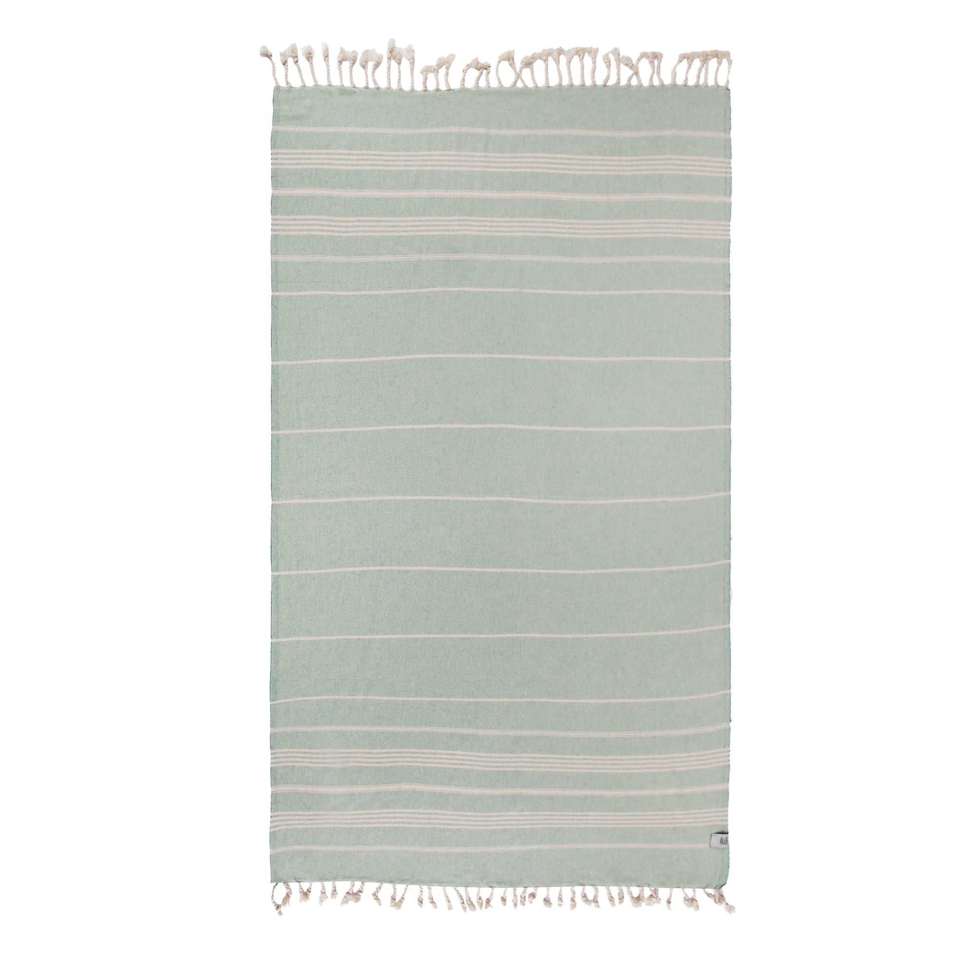 Sultan Beach Towel displayed in vibrant colors, showcasing its traditional woven style and ultra-soft texture, perfect for beach and picnic use.