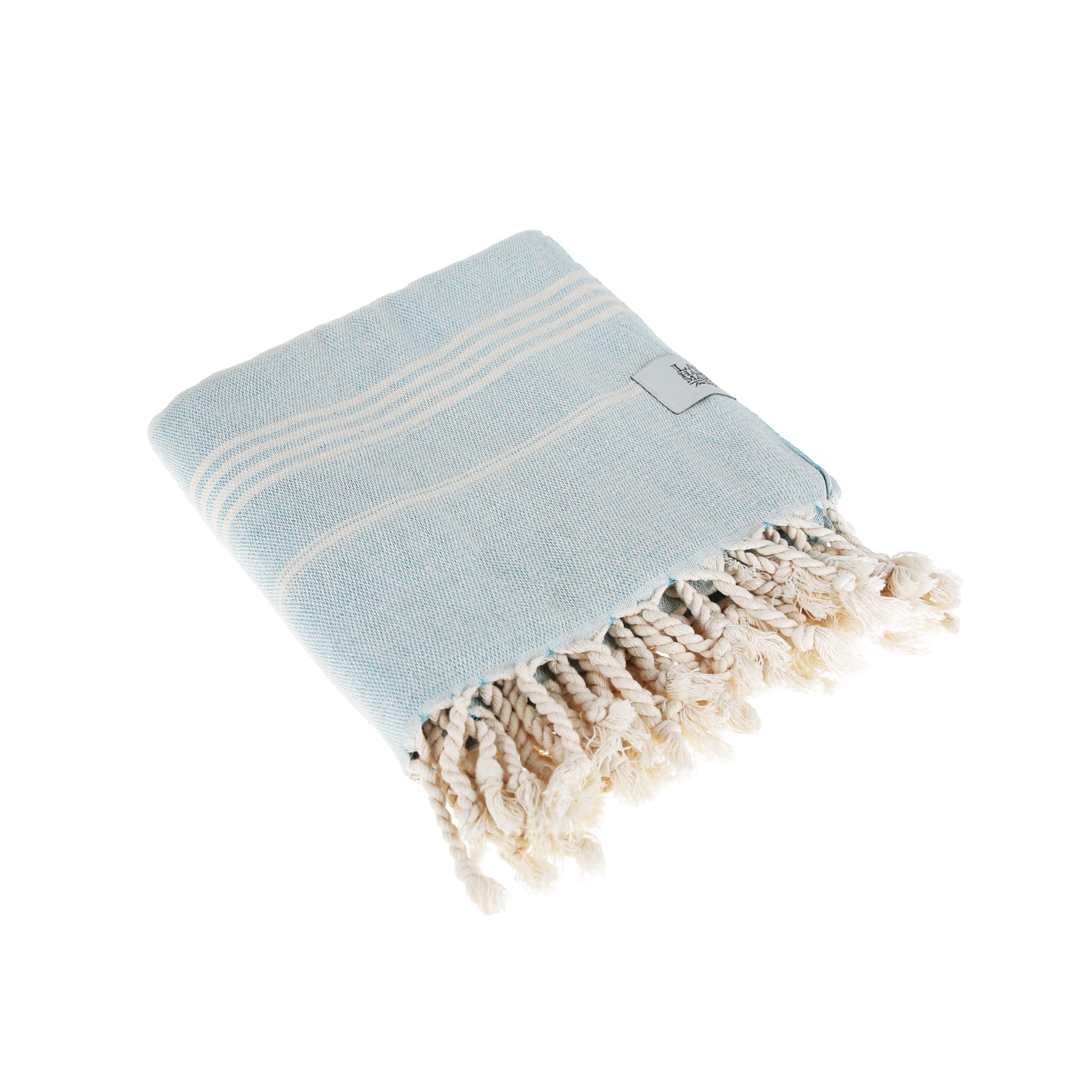 Sultan Beach Towel displayed in vibrant colors, showcasing its traditional woven style and ultra-soft texture, perfect for beach and picnic use.